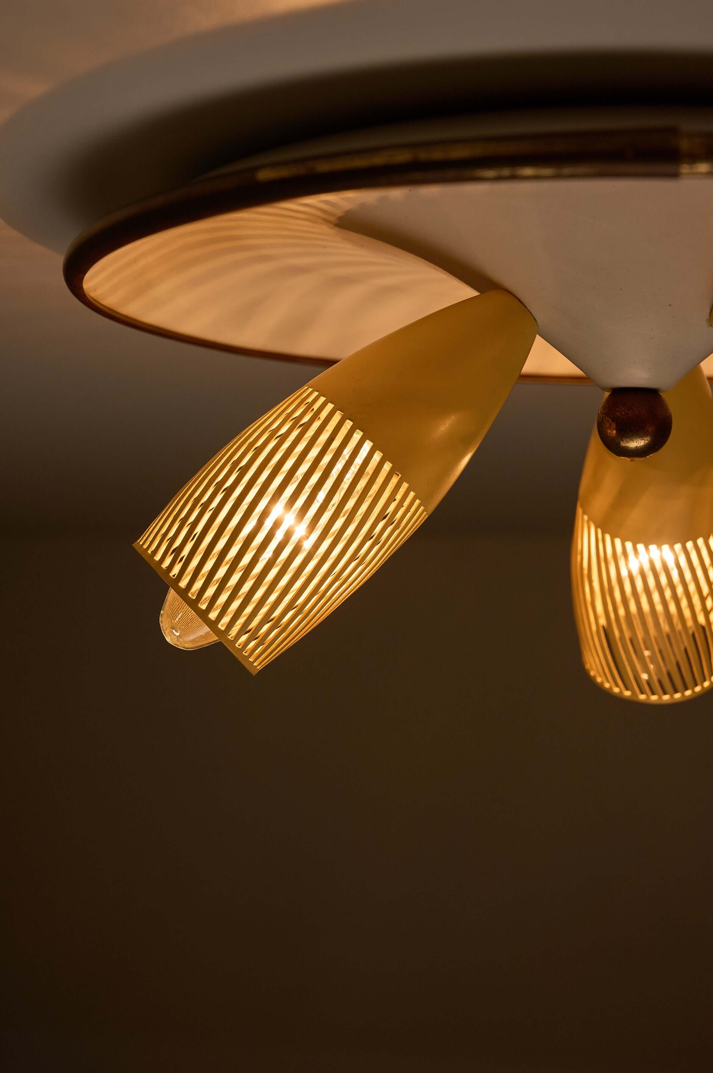 Mid-Century Yellow & Brass Ceiling Lamp by Hillebrand with perforated yellow shades and brass rim.