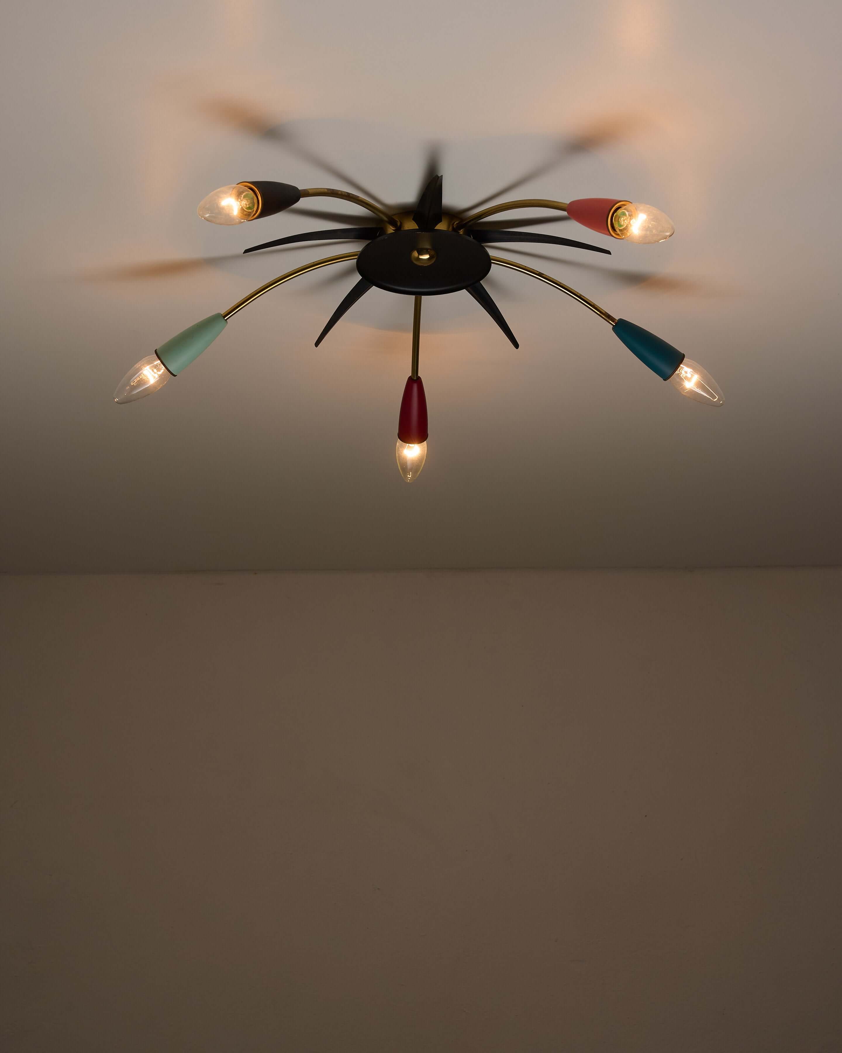 Mid-Century Multicolor Sputnik Ceiling Lamp showcasing a dynamic starburst design with brass arms and colored metal cone sockets.