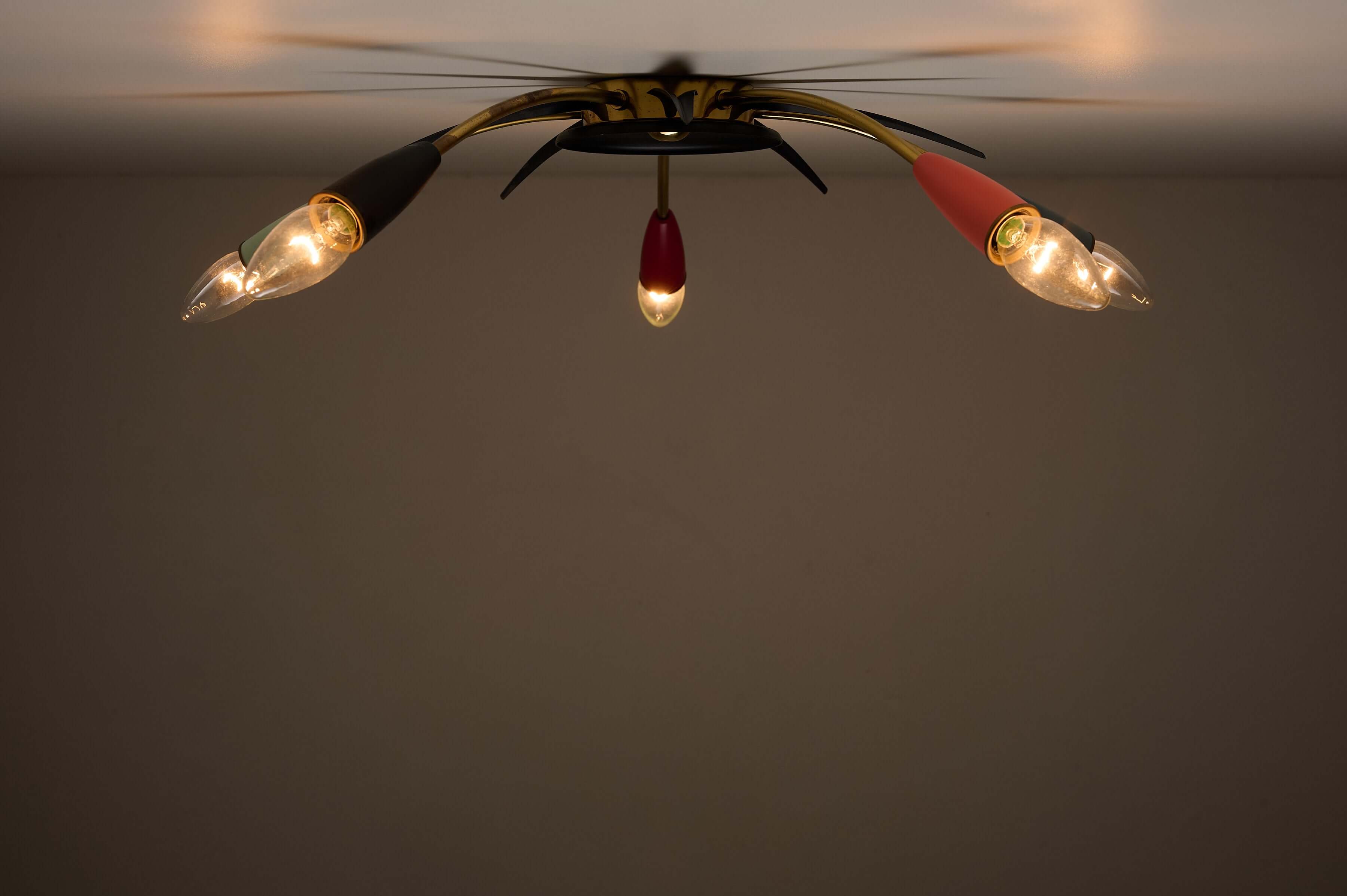 Mid-Century Multicolor Sputnik Ceiling Lamp with five curved brass arms and colorful cone sockets.