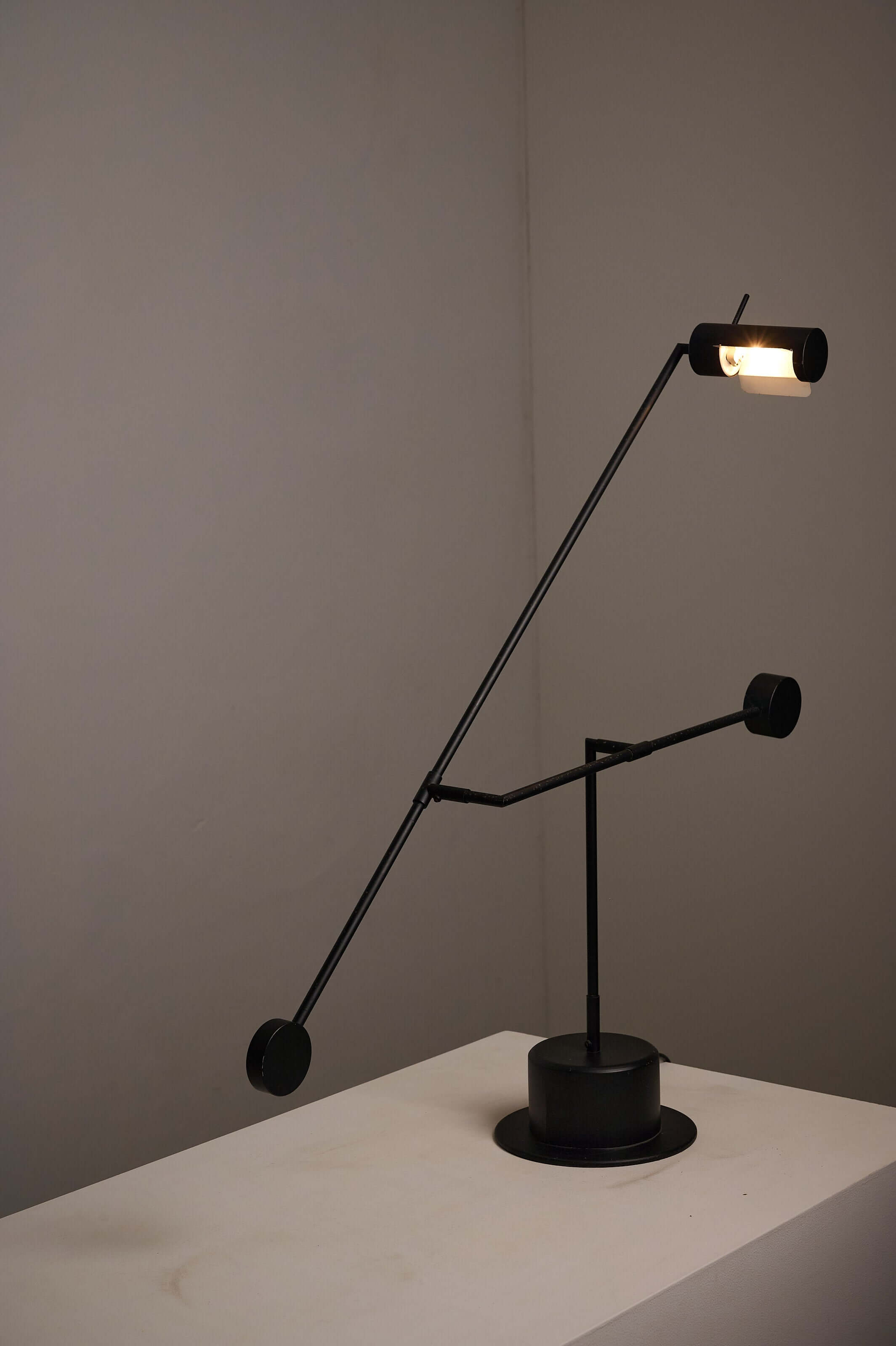 Matte Black Counterbalance Desk Lamp by Sische showcasing its minimalist design and adjustable arms.