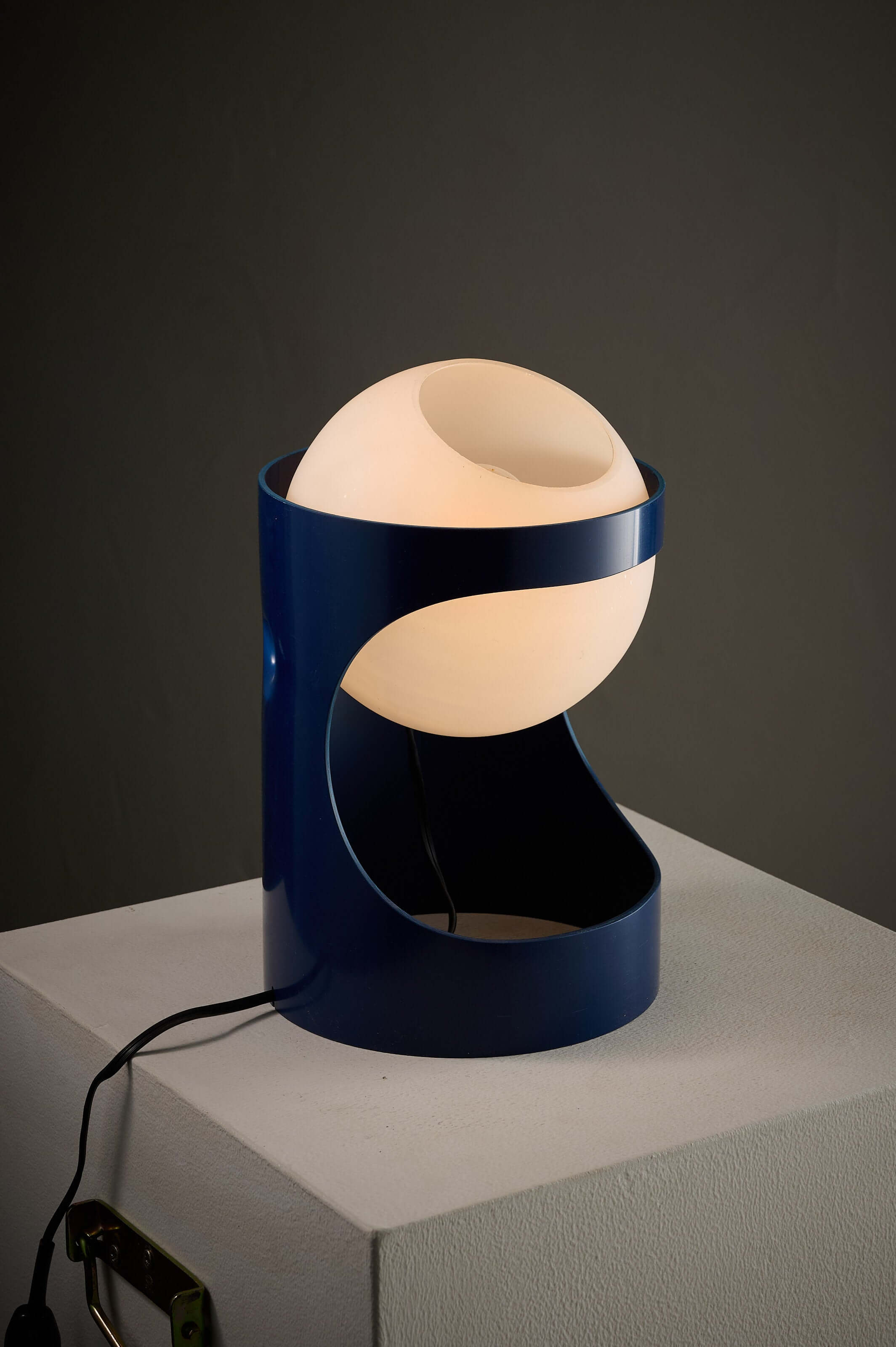 Blue 'L1' Table Lamp by Jacob Guggerli showcasing a unique design with an opal glass sphere for atmospheric lighting.