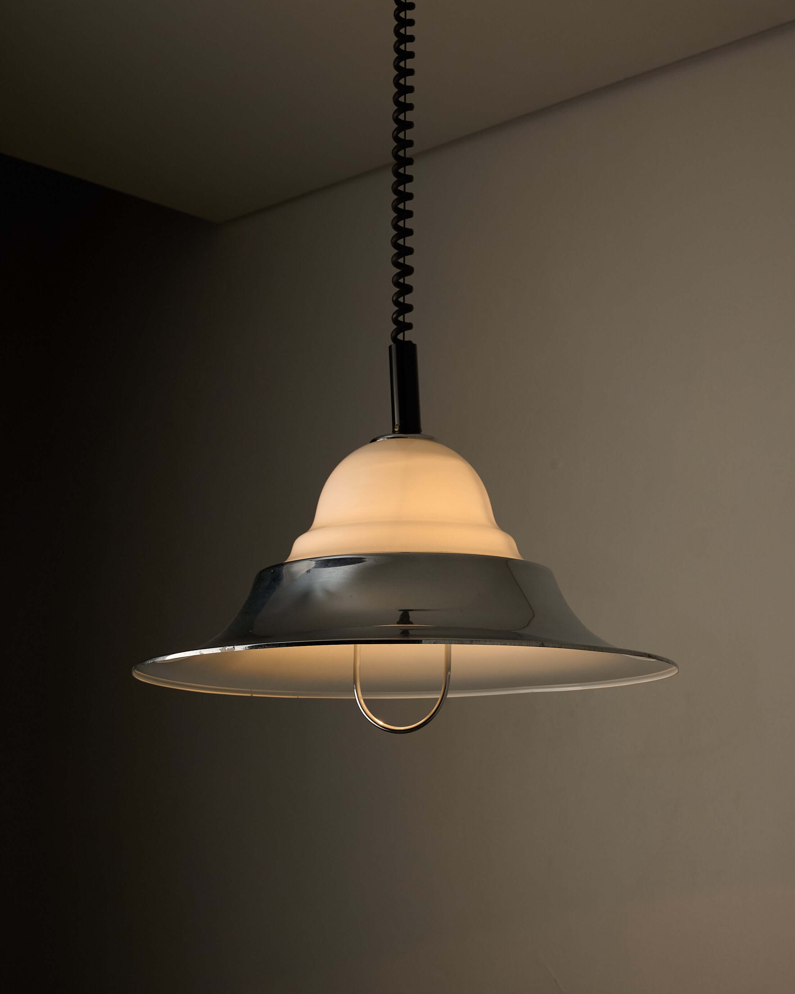 Chrome and Opal Glass Model 7565 Adjustable Pull-Down Lamp by Cosack hanging with polished chrome shade and opal glass.