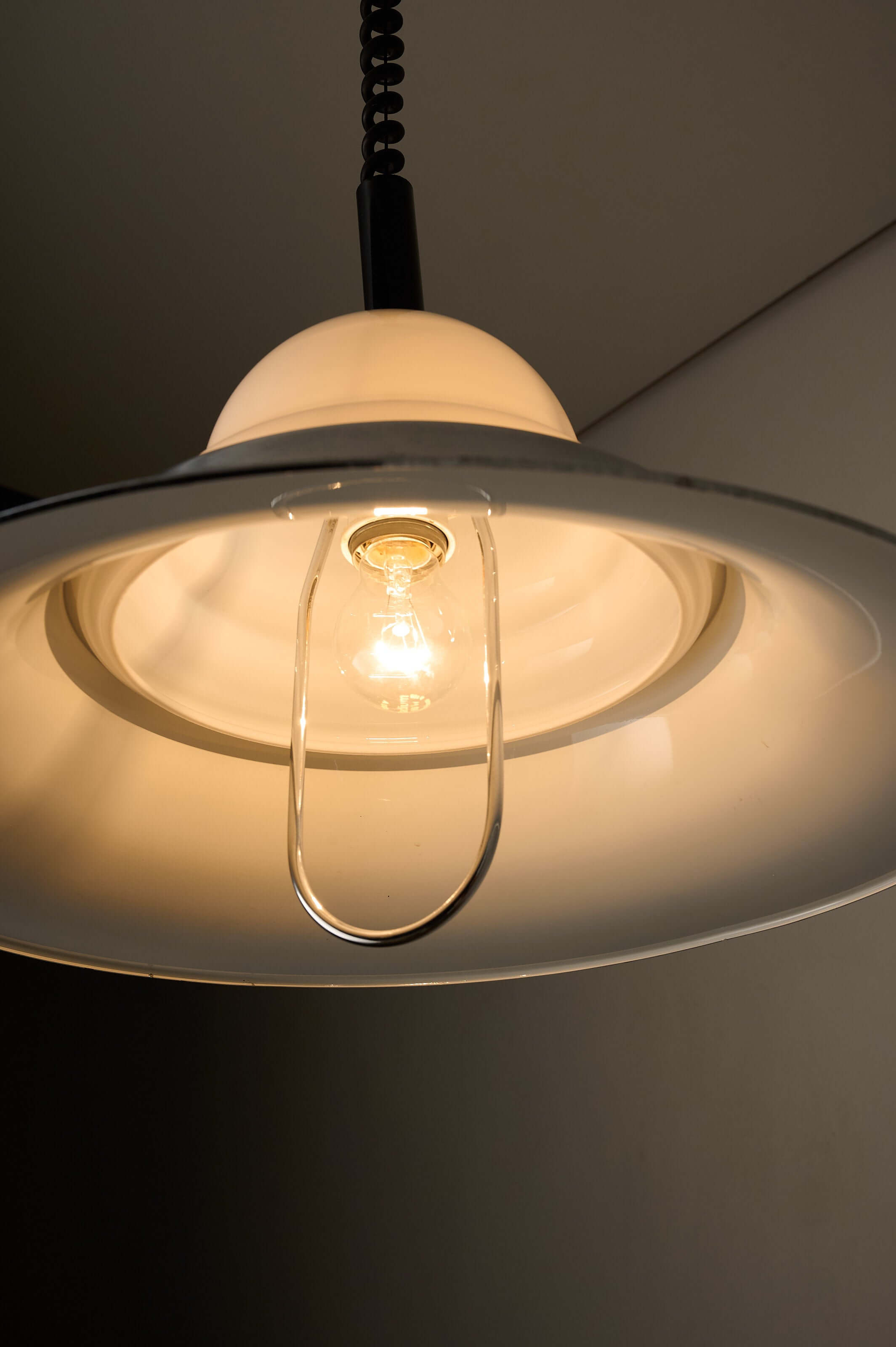 Chrome and Opal Glass Model 7565 Adjustable Pull-Down Lamp by Cosack showcasing the polished chrome shade and milk glass.