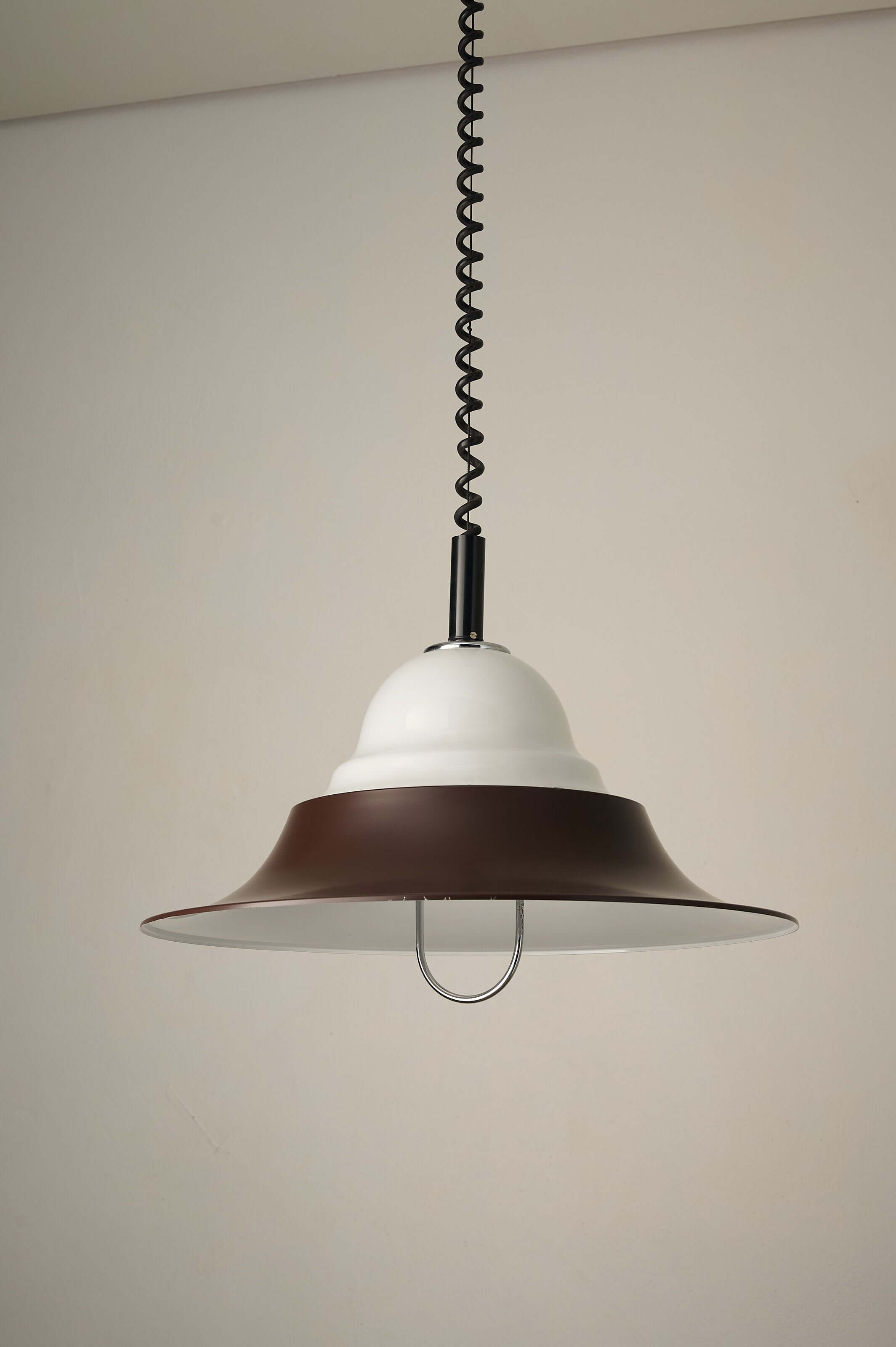 Brown and Opal Glass Model 7565 Adjustable Pull-Down Lamp by Cosack hanging with a black spiral cable.