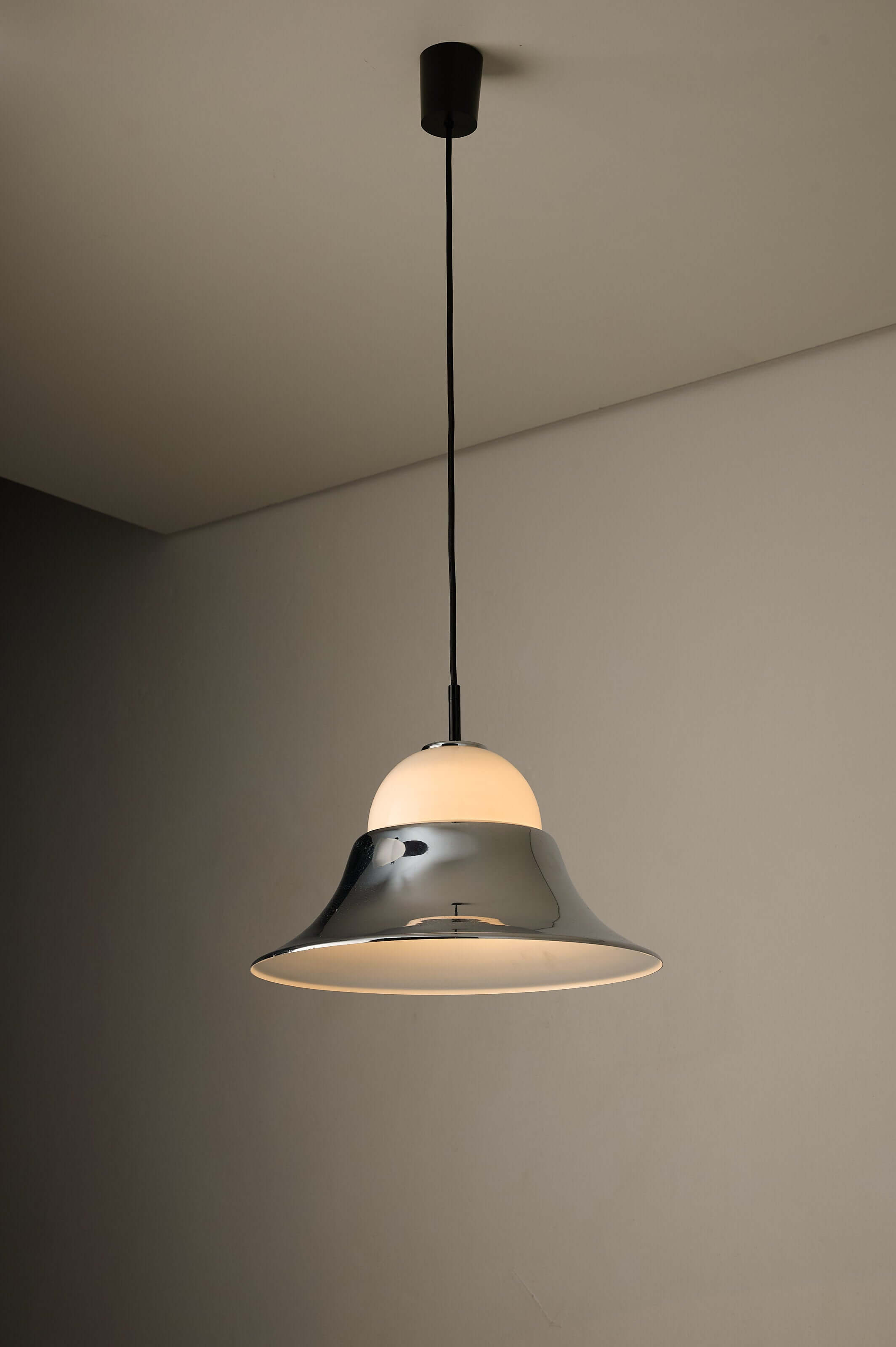 Chrome and Opal Glass Model 7563 Pendant by Cosack hanging from a ceiling, featuring polished chrome and opal glass.