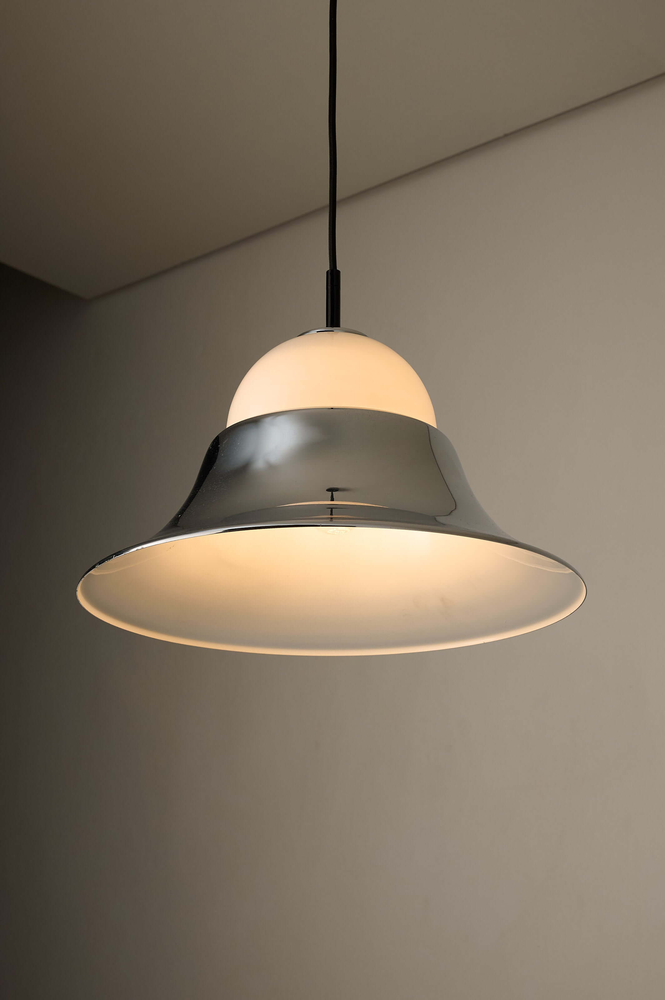 Chrome and Opal Glass Model 7563 Pendant by Cosack illuminated with a polished chrome finish and opal glass diffuser.