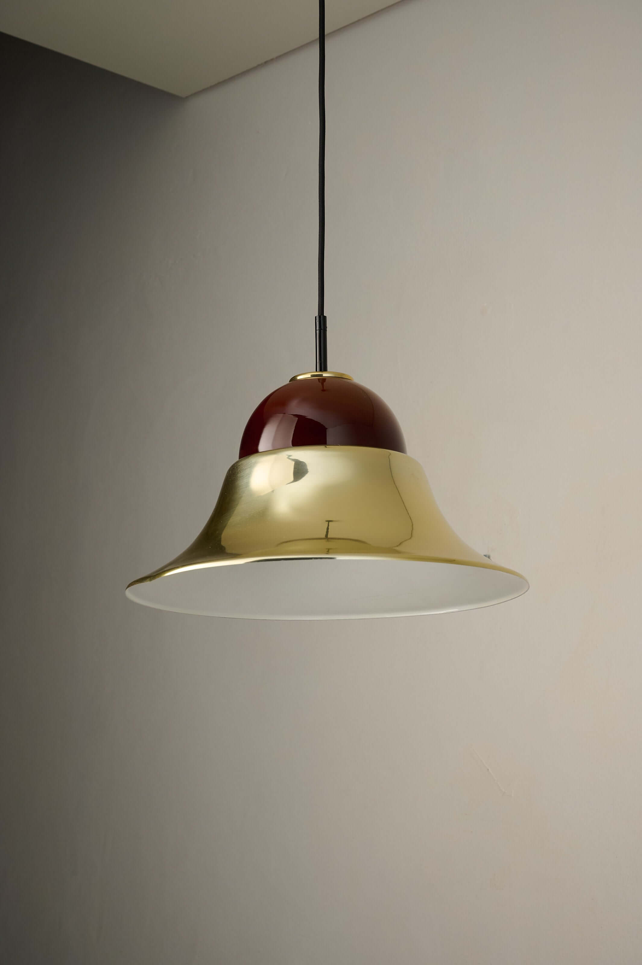 Brass and Amber Glass Model 7563 Pendant by Cosack hanging lamp with gold-tone shade and amber glass diffuser.