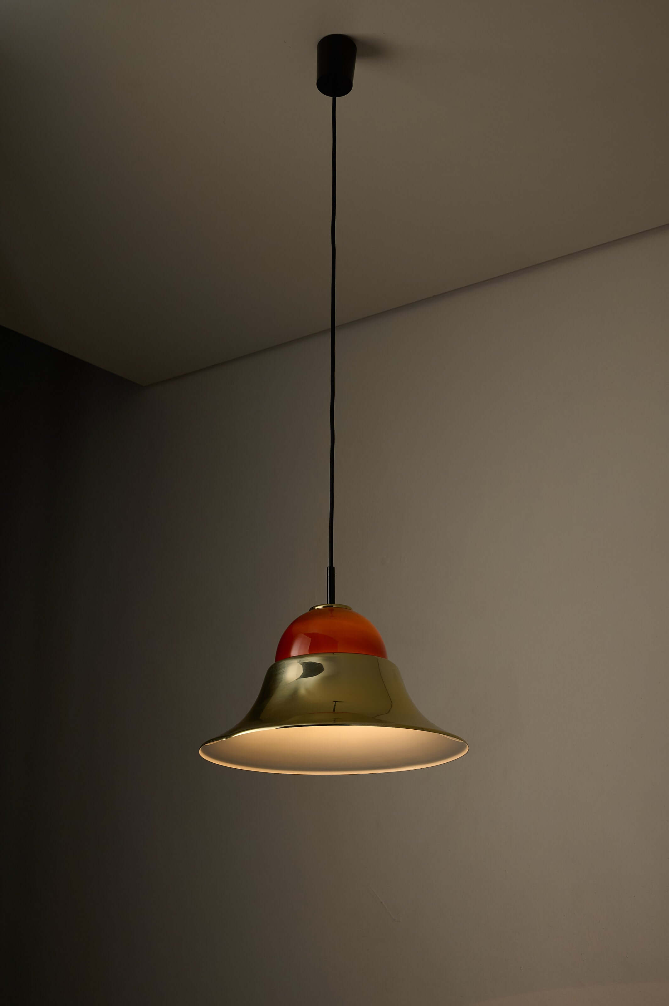 Brass and Amber Glass Model 7563 Pendant by Cosack hanging lamp in a modern interior.
