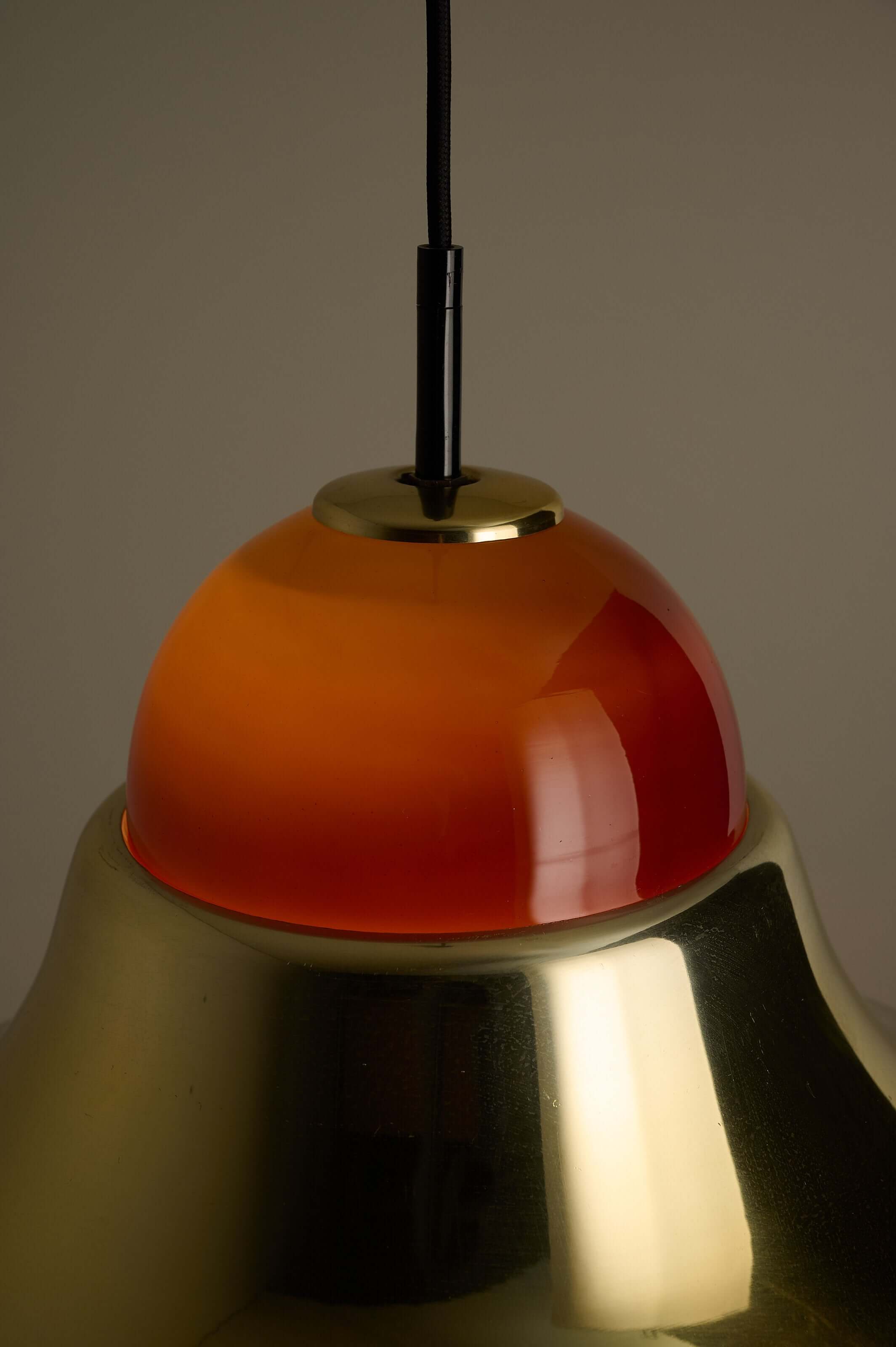 Brass and Amber Glass Model 7563 Pendant by Cosack showcasing polished gold-tone metal and vibrant amber glass.