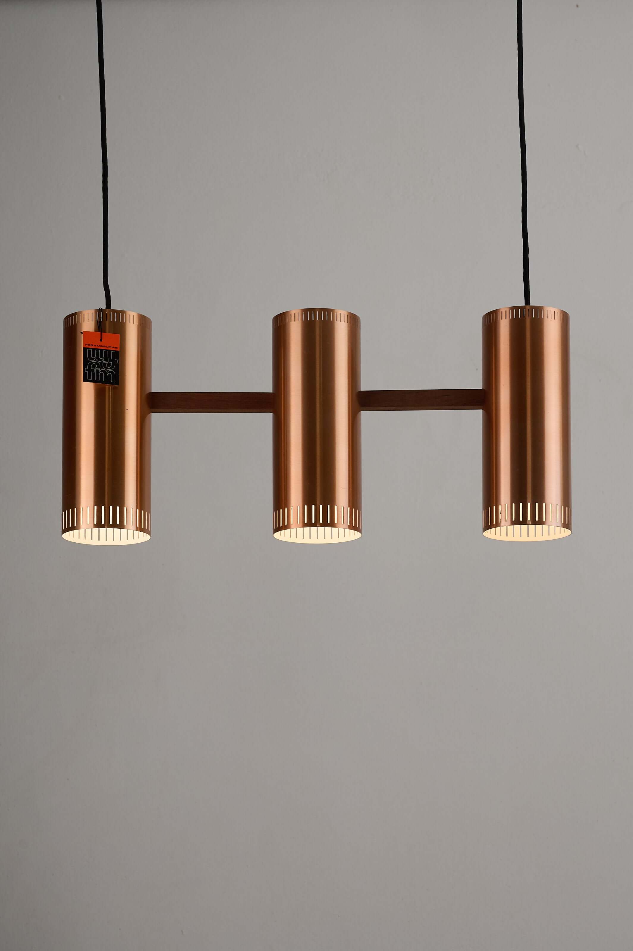 Copper "Cylindre III" 3-Light Linear Pendant by Jo Hammerborg for Fog & Mørup, 1960, featuring a warm copper finish.