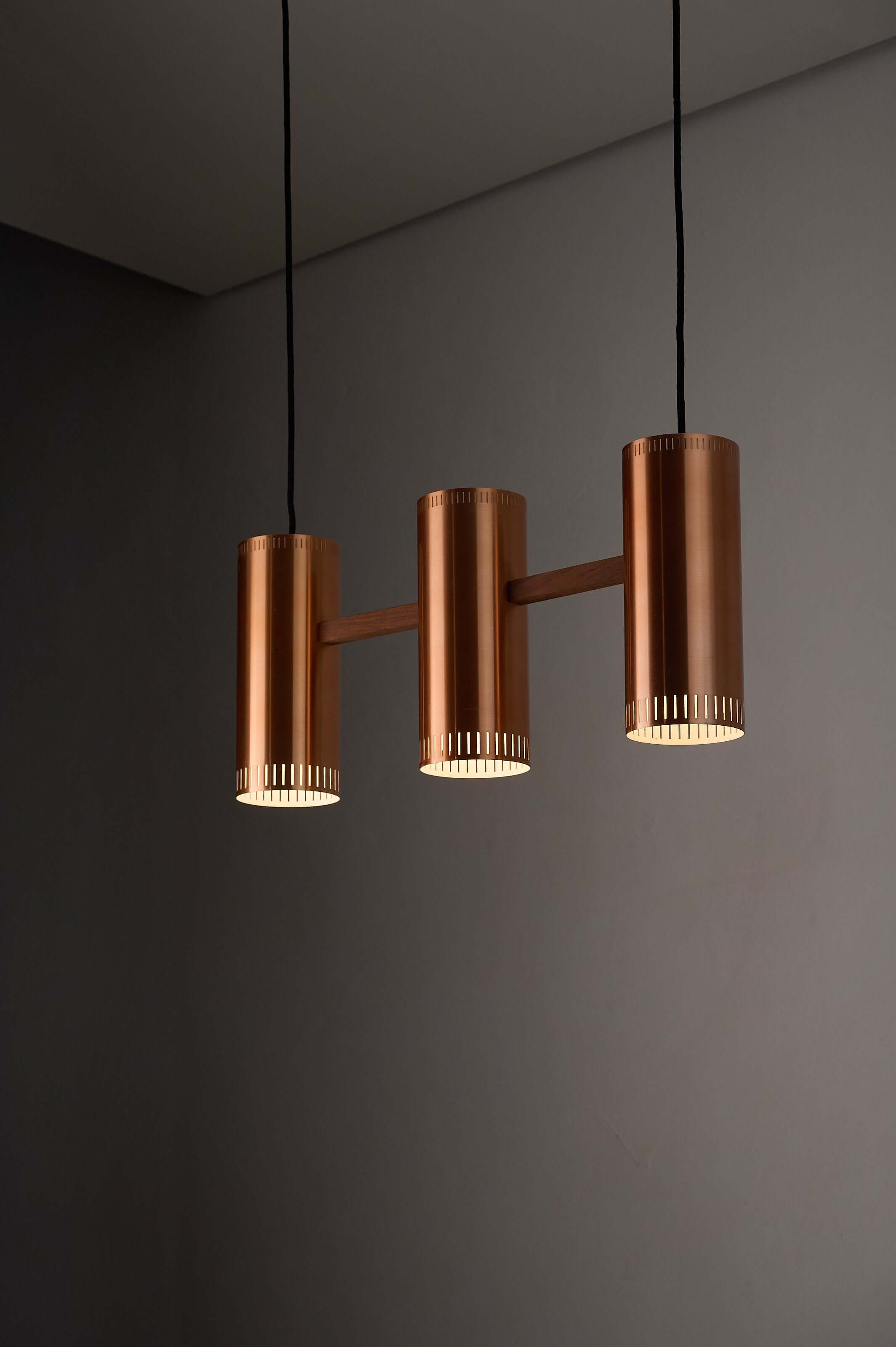 Copper "Cylindre III" 3-Light Linear Pendant by Jo Hammerborg for Fog & Mørup, 1960 in warm copper finish.