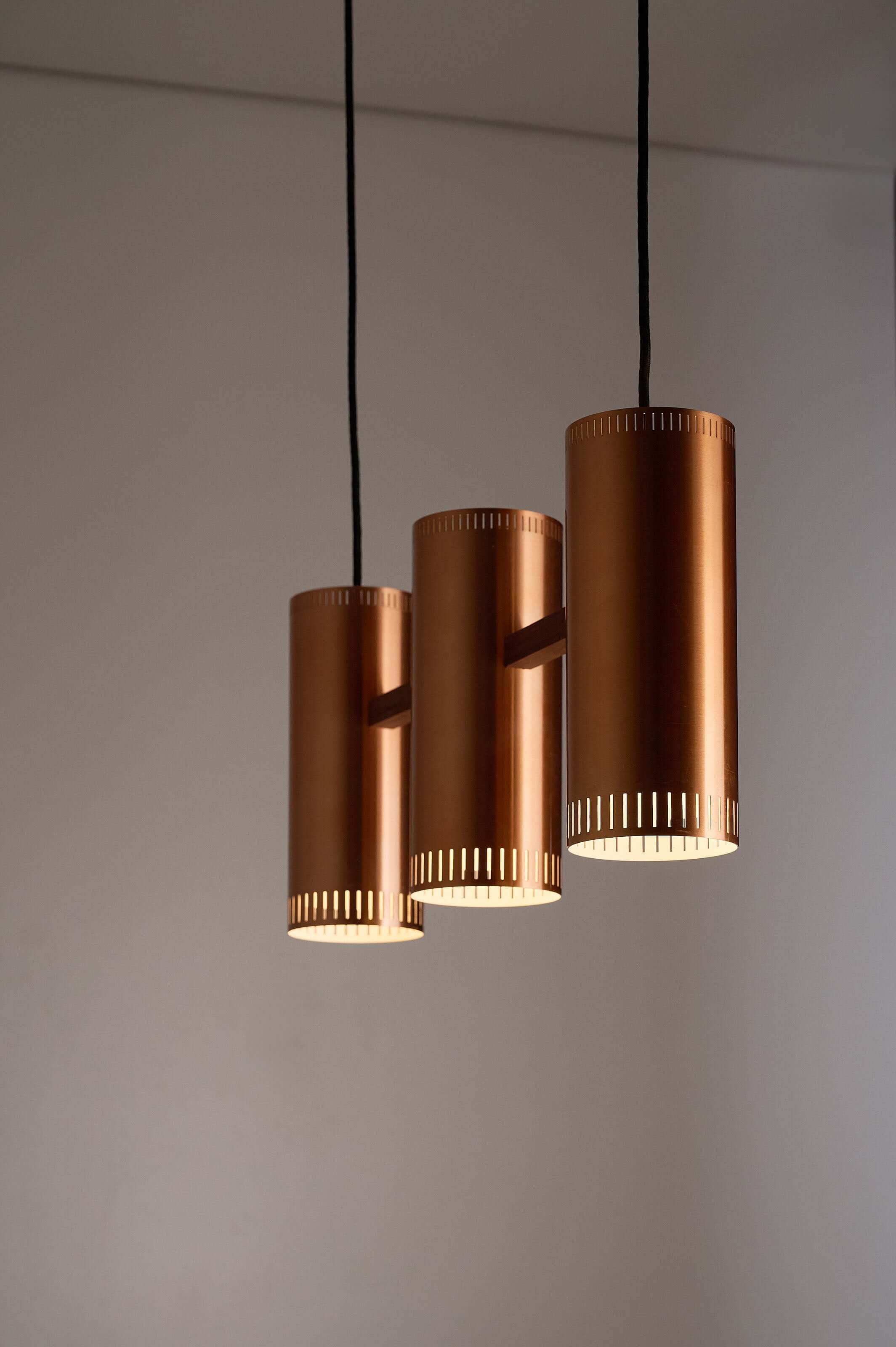 Copper "Cylindre III" 3-Light Linear Pendant by Jo Hammerborg for Fog & Mørup, 1960 showcasing three cylindrical shades.