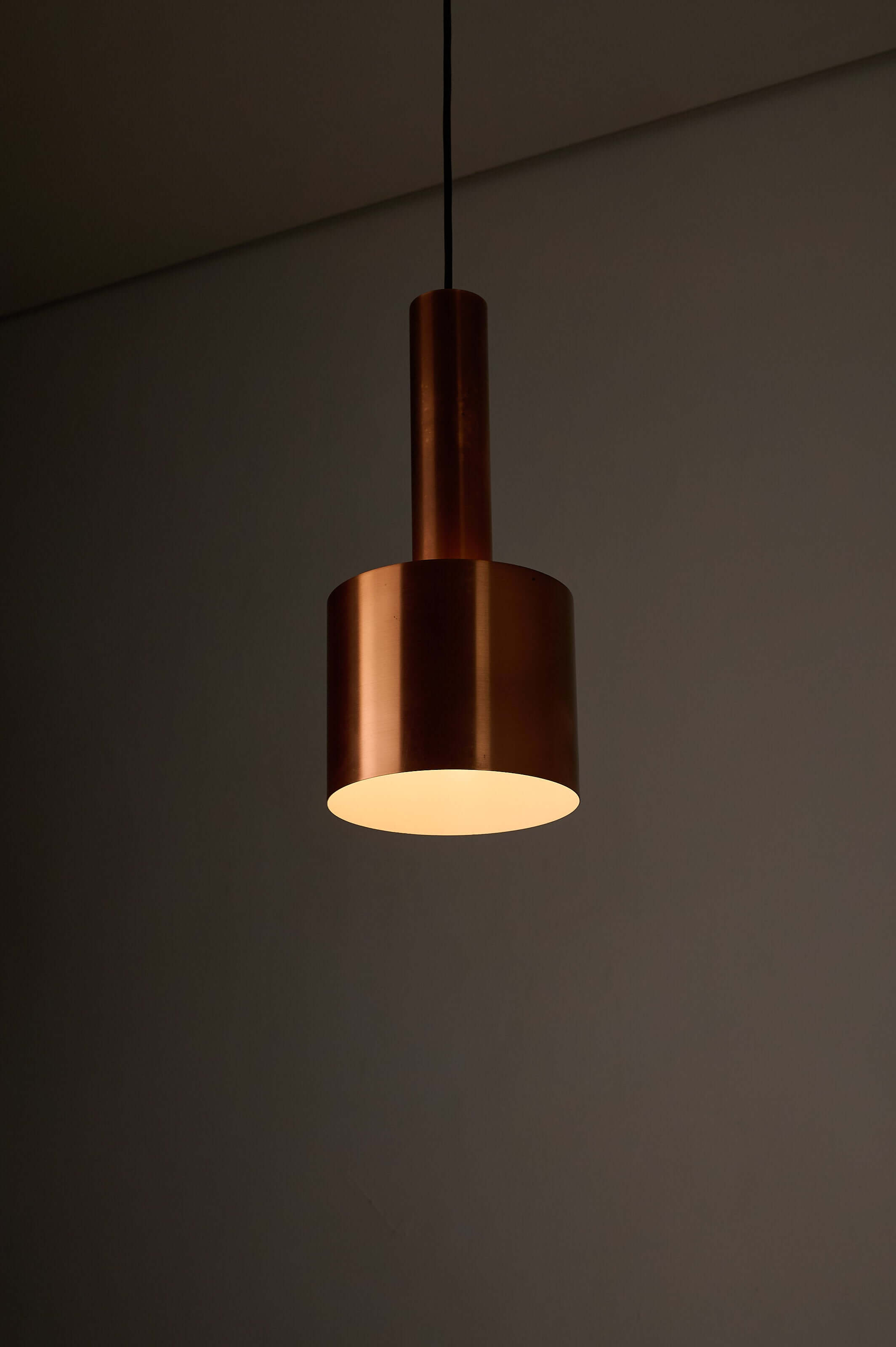 Copper "Club" Pendant by Jo Hammerborg for Fog & Mørup, 1960s hanging lamp illuminating a modern interior.