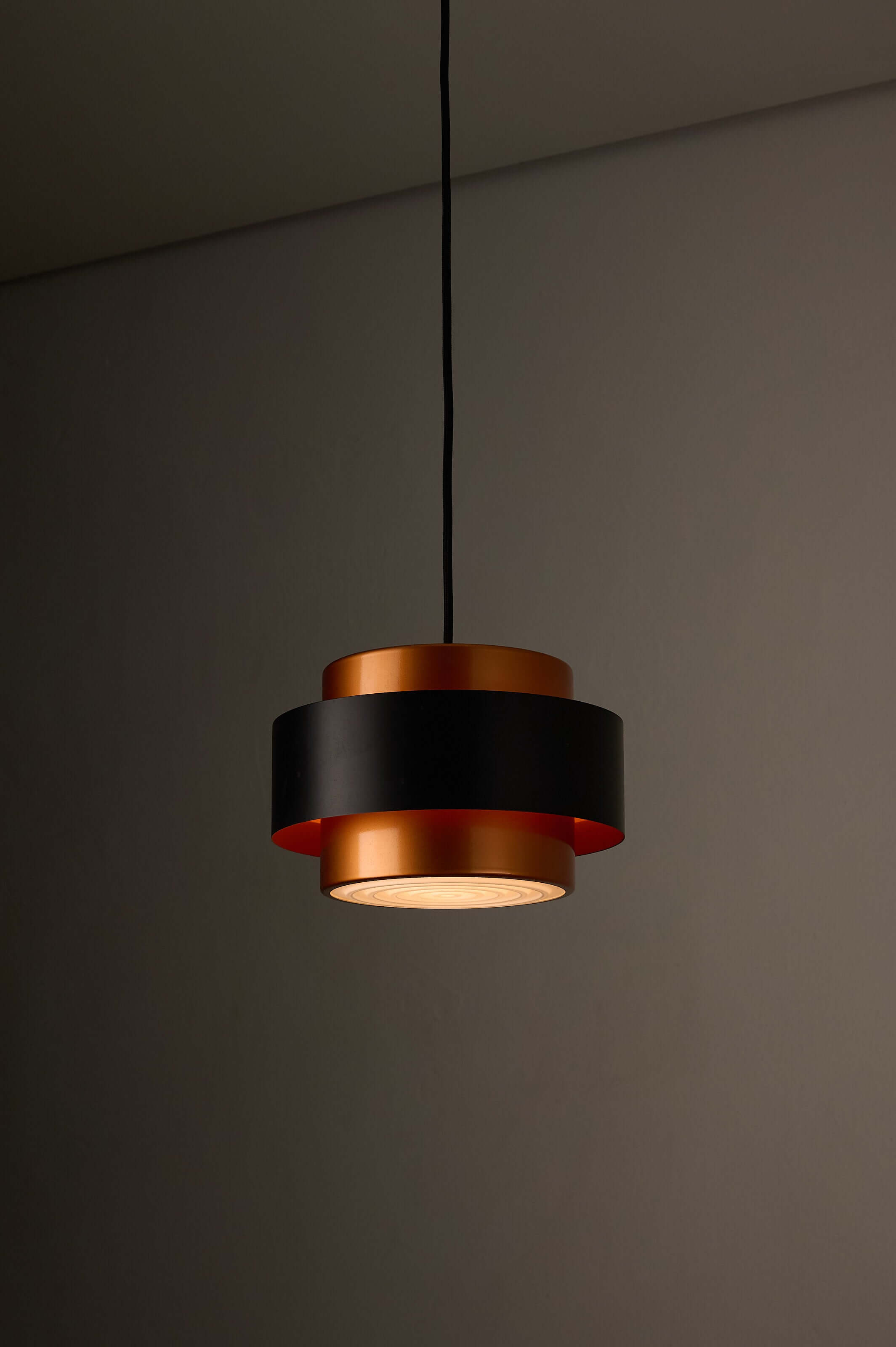 Copper and Black "Juno" Pendant by Jo Hammerborg for Fog & Mørup, 1963 in a stylish setting.