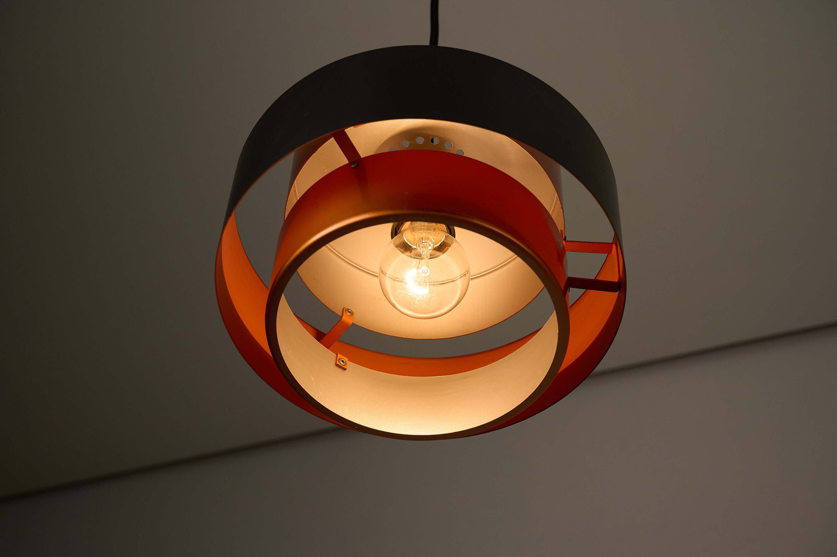 Copper and Black "Juno" Pendant by Jo Hammerborg for Fog & Mørup, 1963 hanging lamp design with colorful interior.