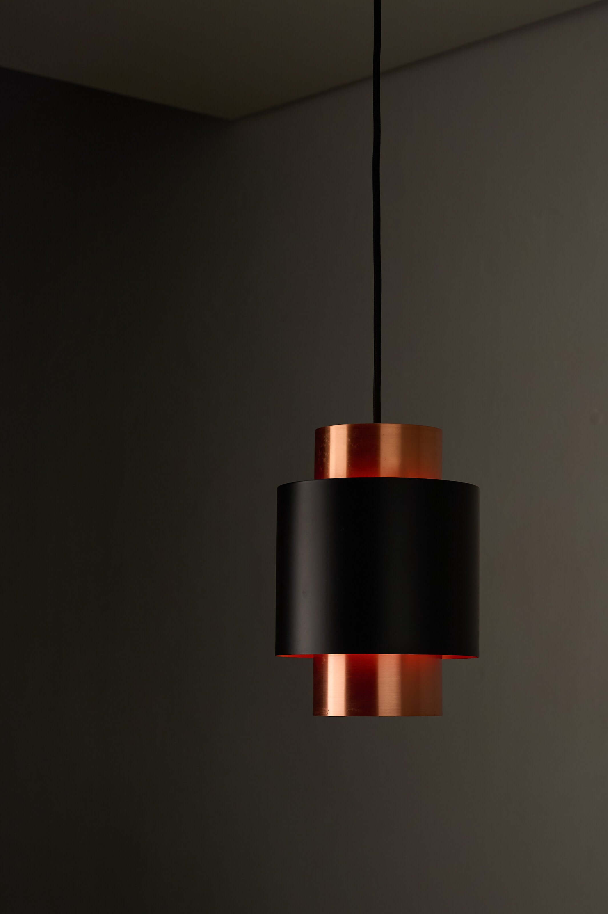 Black and Copper "Tunika" Pendant by Jo Hammerborg for Fog & Mørup, 1960 hanging in a modern setting.