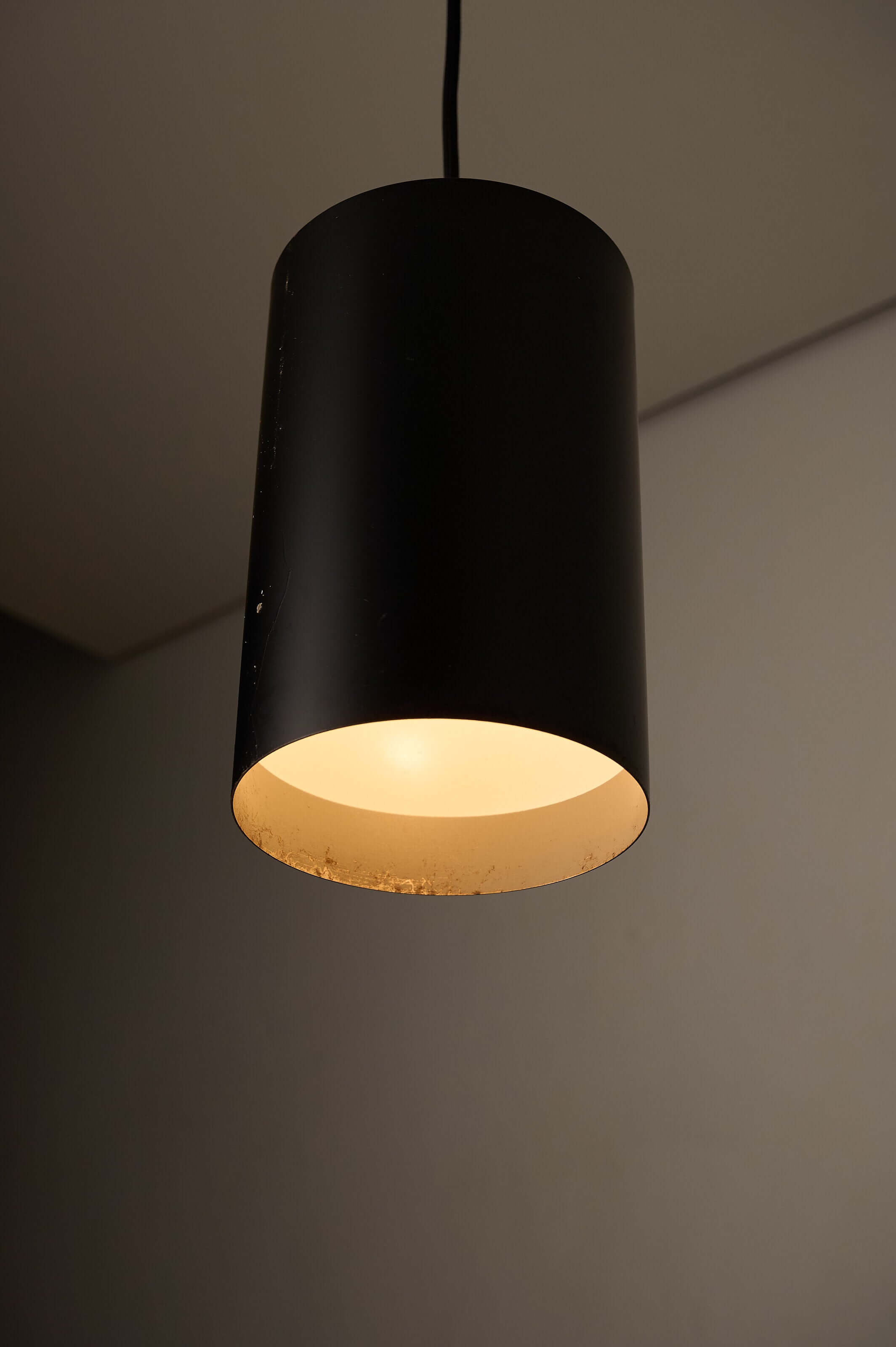 Minimalist Black Cylinder Pendant by Fog & Mørup, 1960s hanging lamp with matte black finish and white interior.