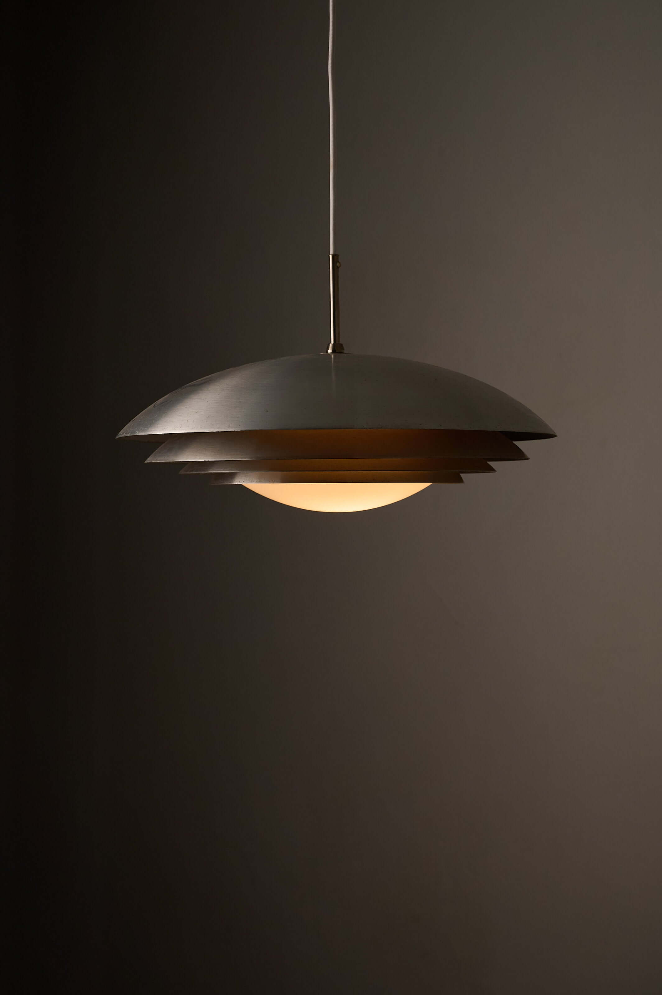 German Space Age "UFO" Pendant in Aluminium and Opal Glass by B+L Leuchten hanging lamp with a satin-finish opal glass dome.