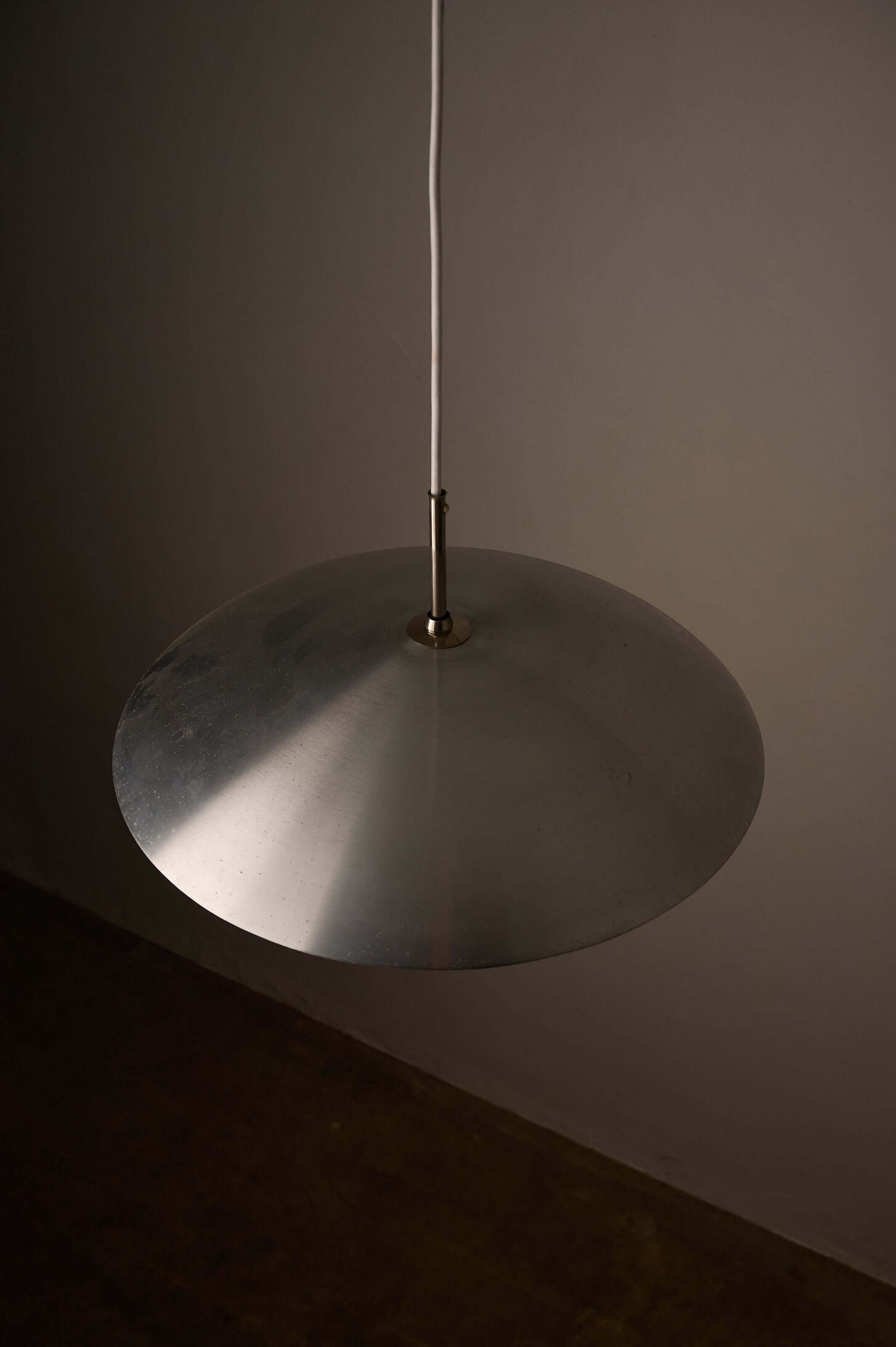 German Space Age "UFO" Pendant in Aluminium and Opal Glass by B+L Leuchten hanging lamp with a polished aluminium shade.