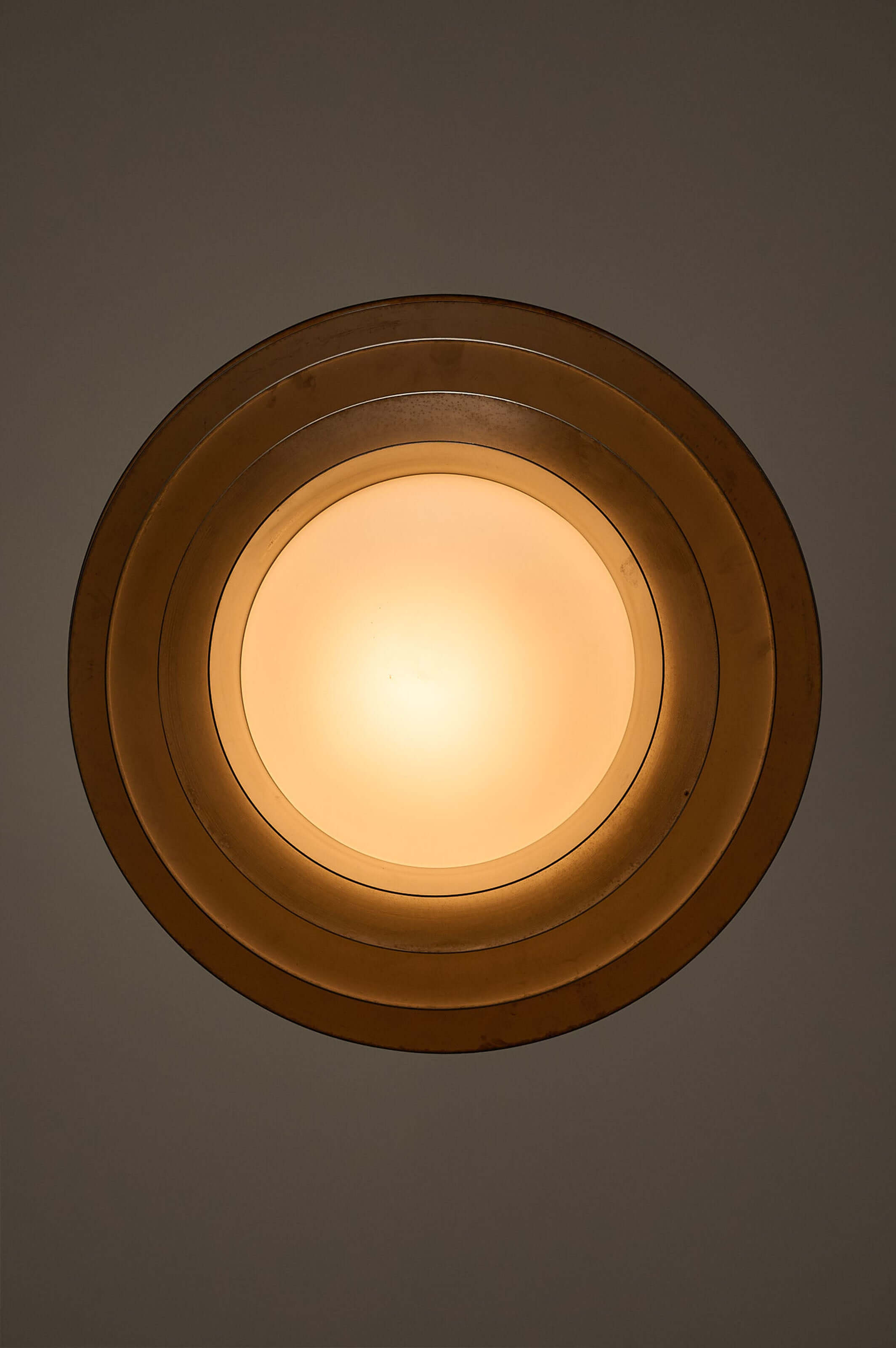 German Space Age "UFO" Pendant in Aluminium and Opal Glass by B+L Leuchten showcasing concentric rings and opal glass.