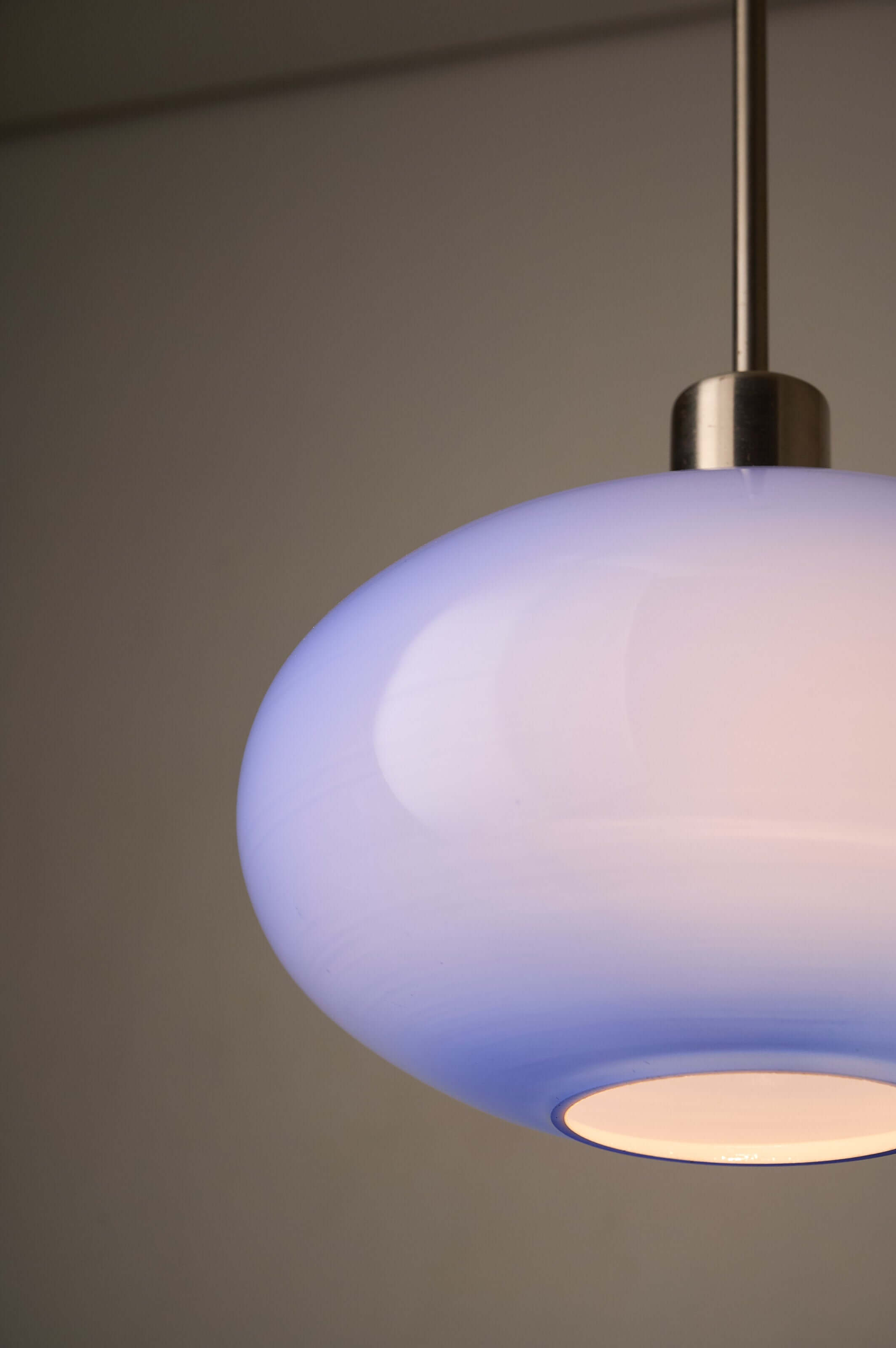 Azure Blue Opaline Glass Pendant with Metal Stem featuring a voluminous oblate shade.