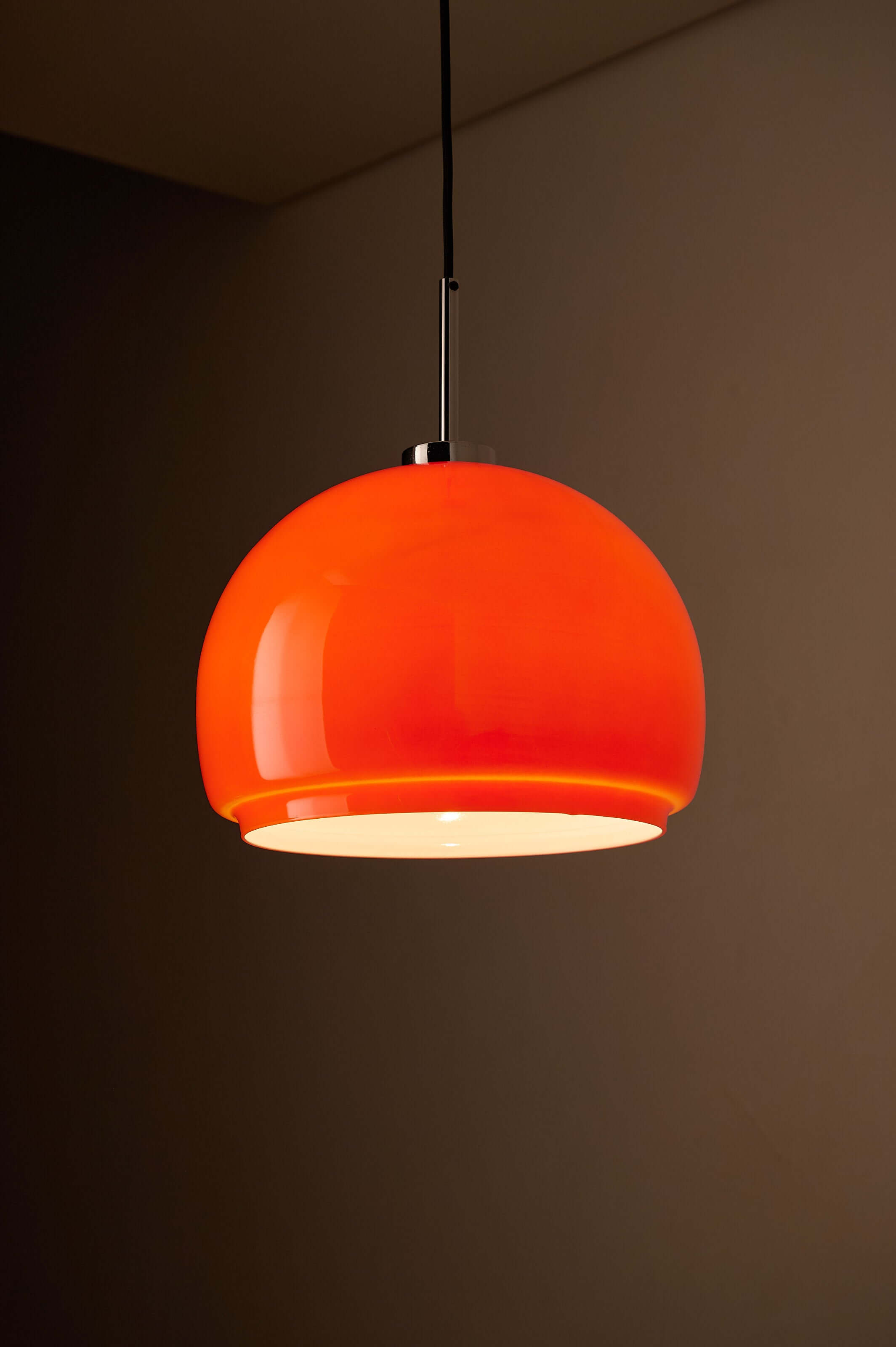 Orange Opaline Glass Pendant by Fog & Mørup, featuring a vibrant orange glass shade and a neutral white inner core.