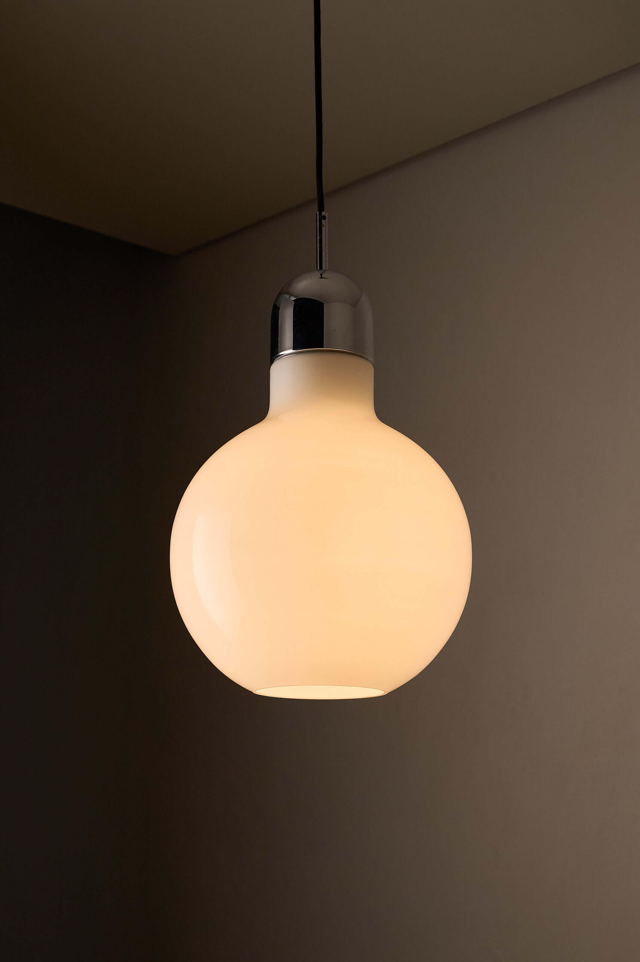 Large Opal Glass & Chrome Pendant by Cosack hanging in a modern setting, showcasing its bulbous shape and polished chrome cap.