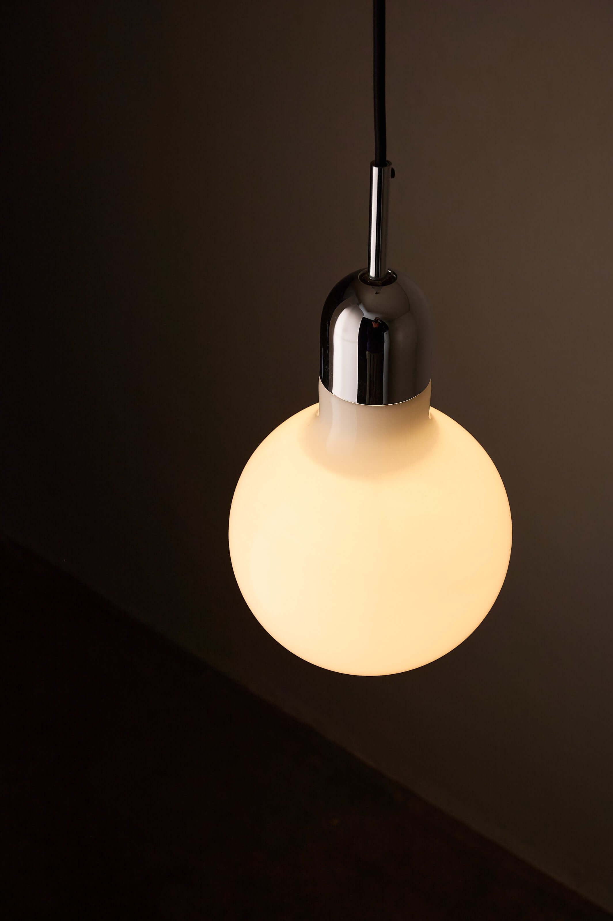 Mid-Century Opal Glass & Chrome Model "7064" Pendant by Cosack hanging light with round opal shade.
