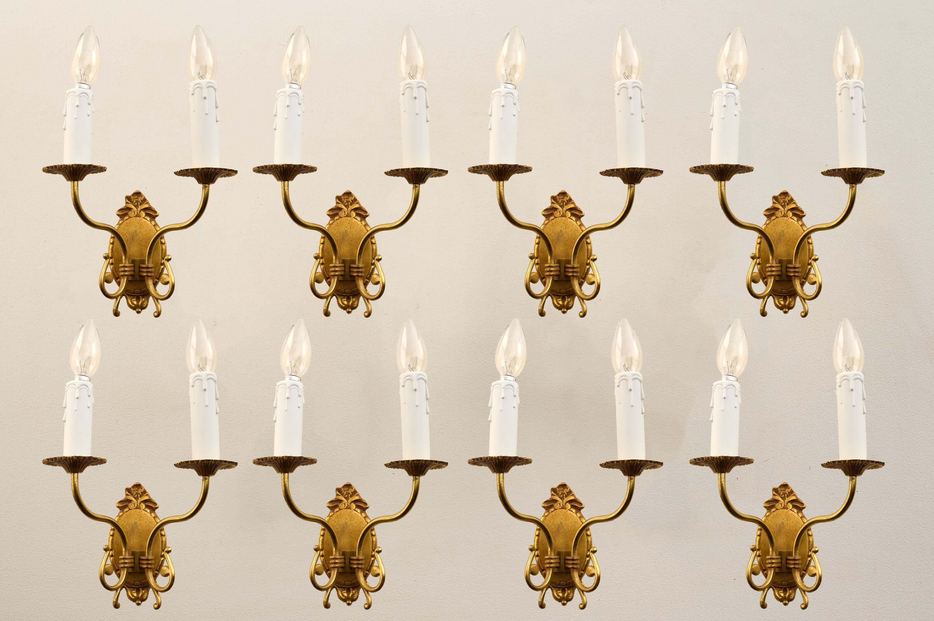 Flemish Baroque Style Brass Wall Sconces Classic displayed in an elegant arrangement with candle-like bulbs.