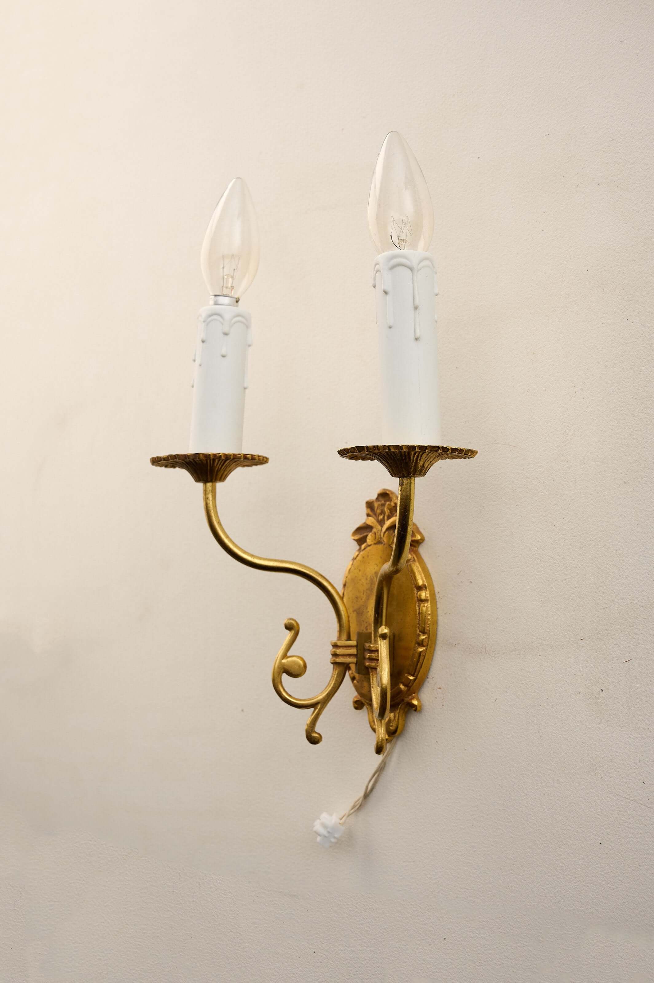 Flemish Baroque Style Brass Wall Sconces Classic with two candle holders and decorative detailing.