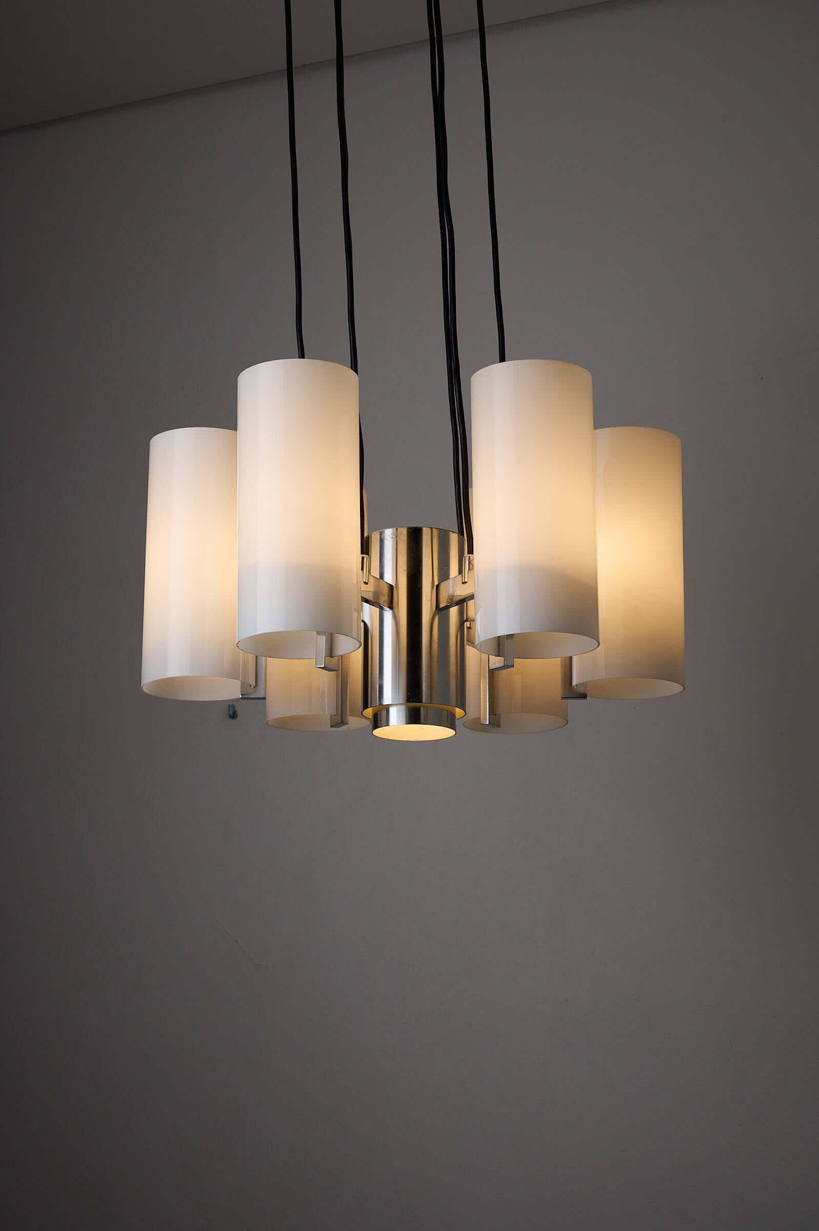 Space Age Chrome and Opaline Glass Chandelier with Six Cylindrical Shades featuring white opaline shades and polished chrome finish.