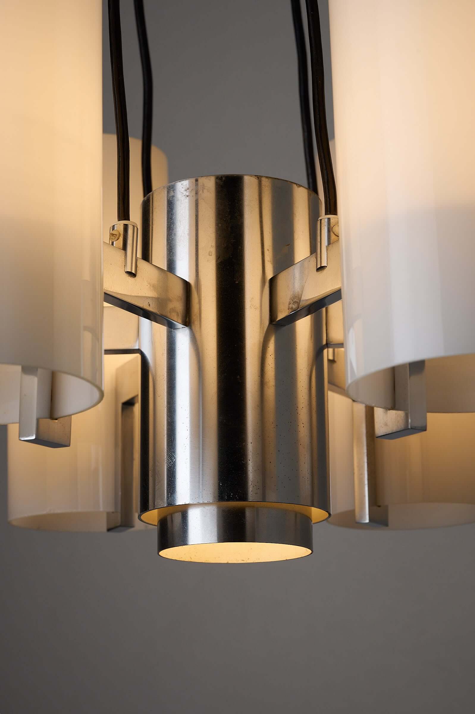 Space Age chrome chandelier featuring polished chrome core and opaline glass shades.