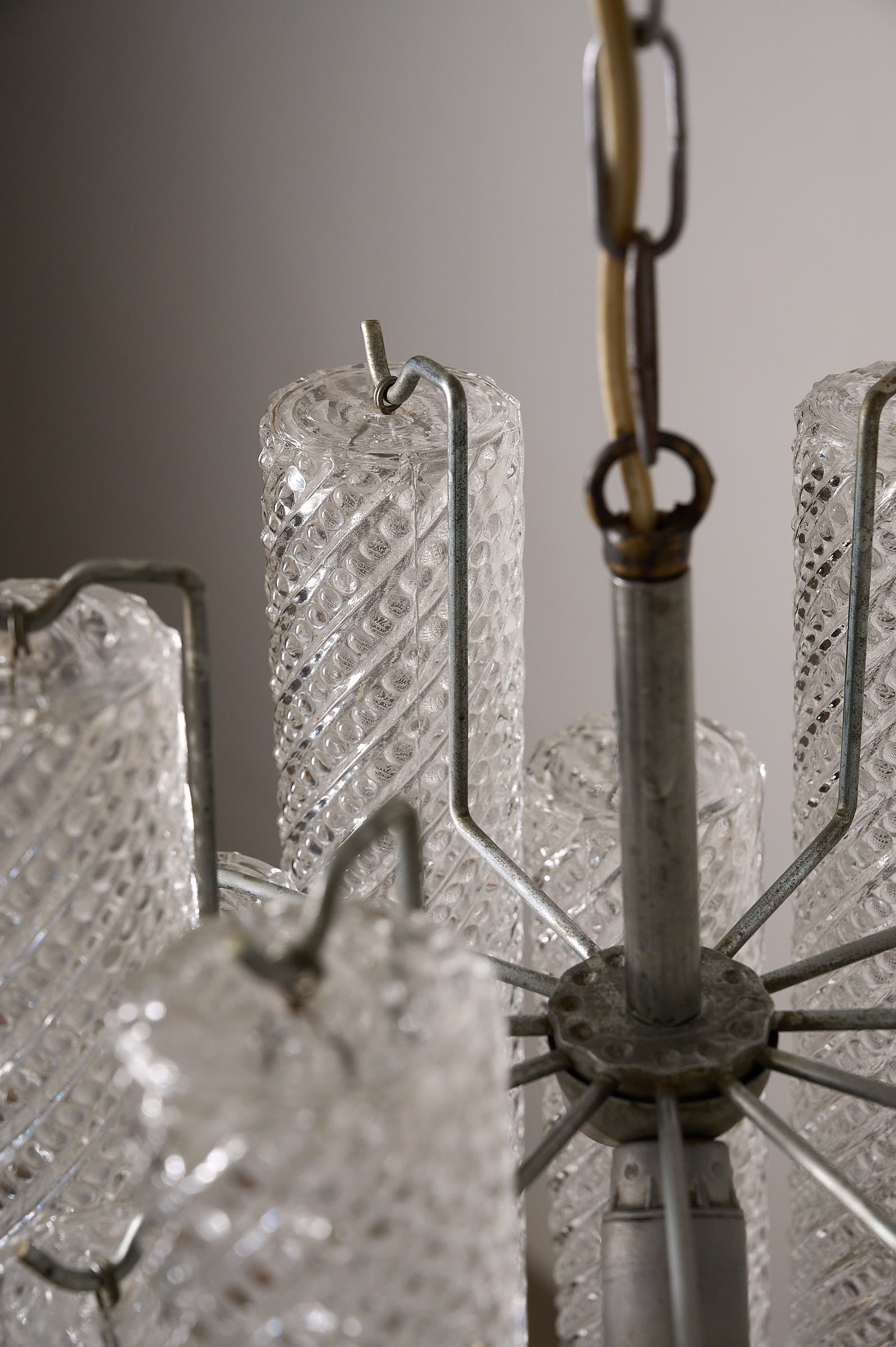 Twelve-Tube Spiral Pattern Glass Chandelier, Italy, 1960s close-up of cylindrical glass tubes with spiral patterns.