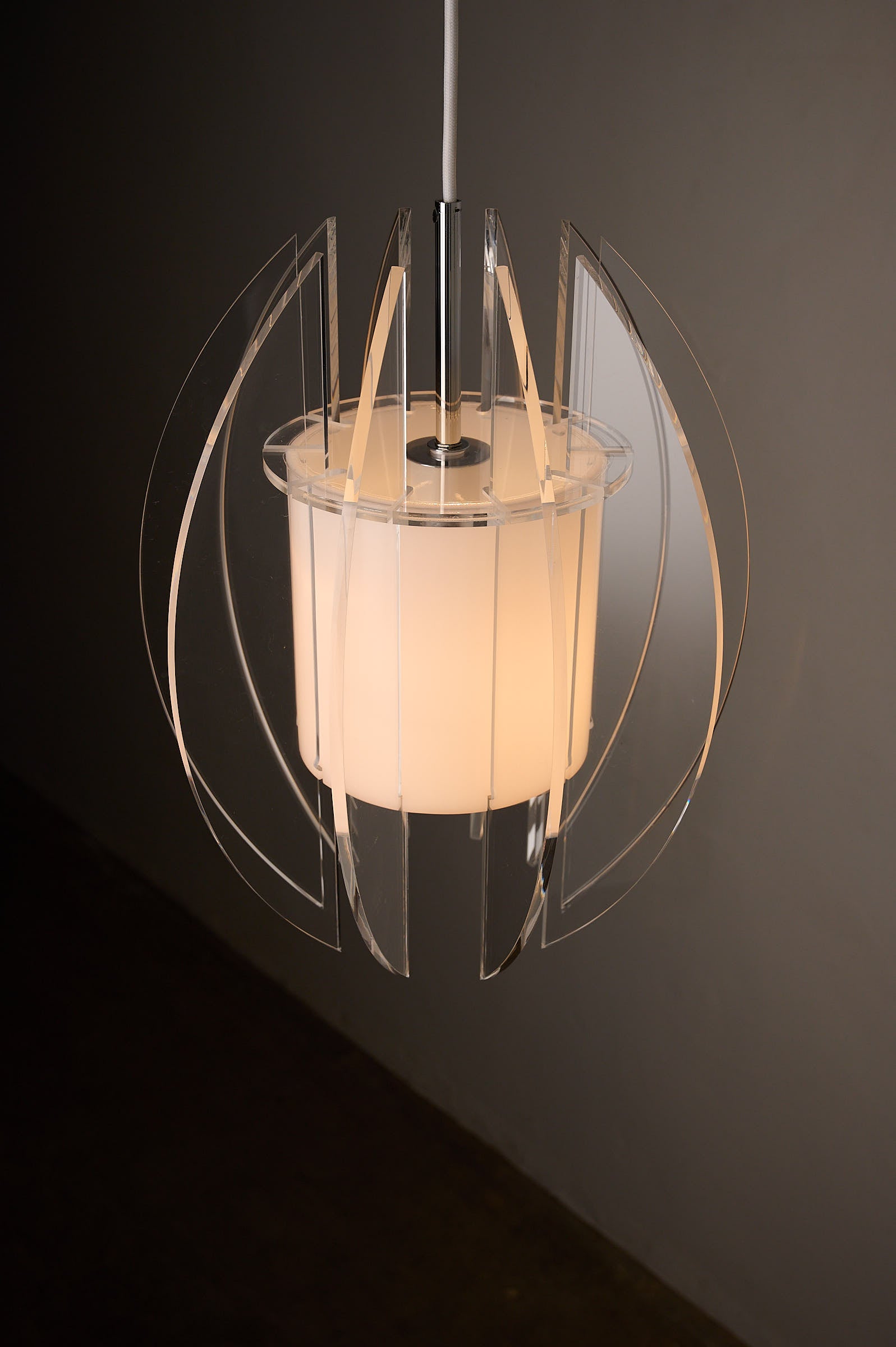 Space Age Acrylic and Perspex Pendant Lamp, 1970s featuring opal white diffuser and clear Perspex fins.