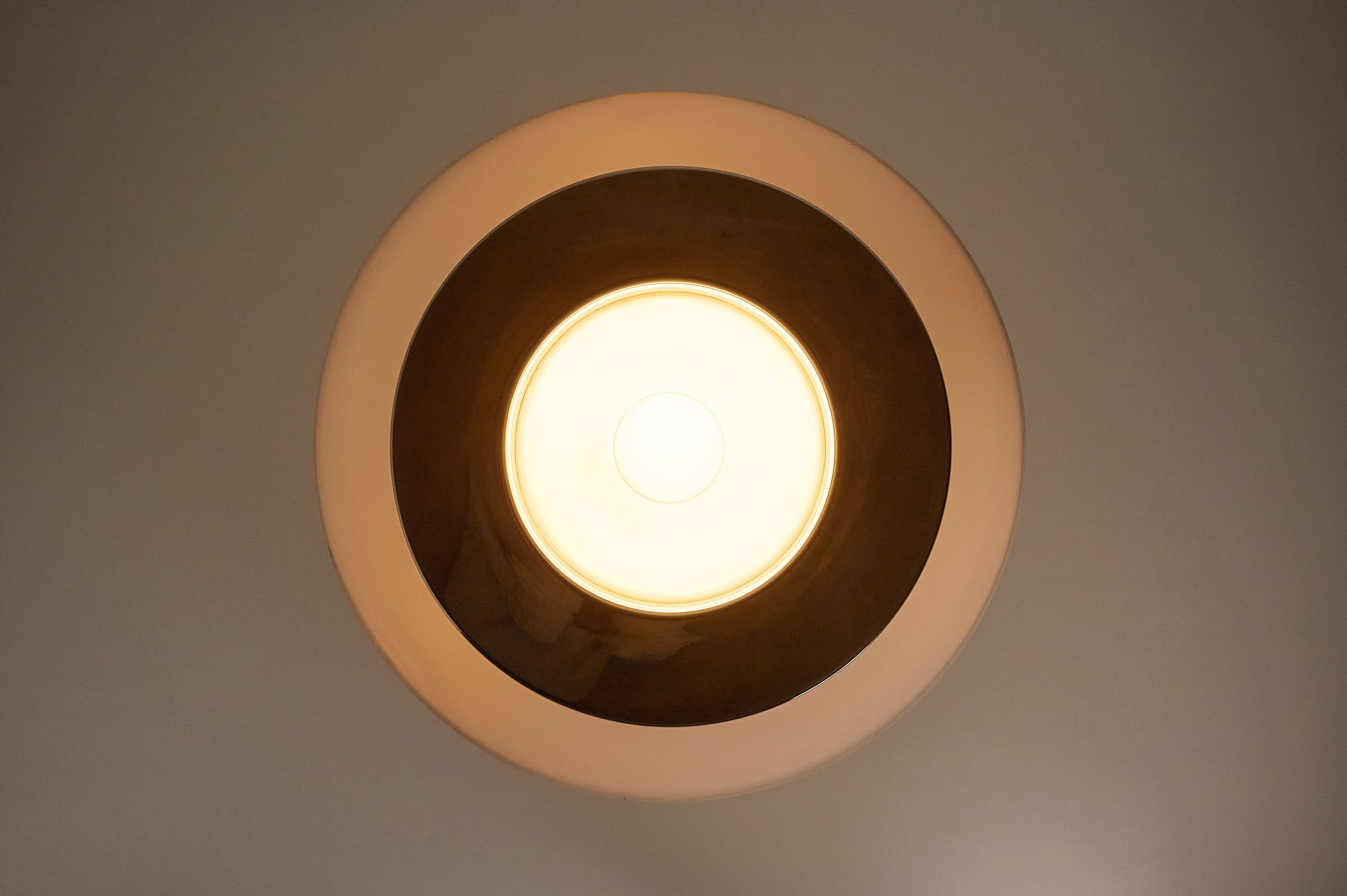 Large Translucent Semi-Dome Pendant Lamp, Italy, 1970s viewed from below, showcasing the translucent shade and internal lighting.