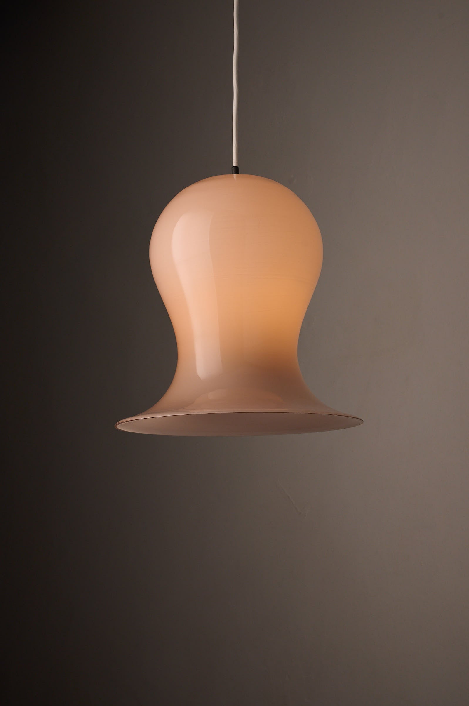Bell-Shaped Glass Pendant in Dusty Rose, 1970s hanging lamp with voluminous shade.