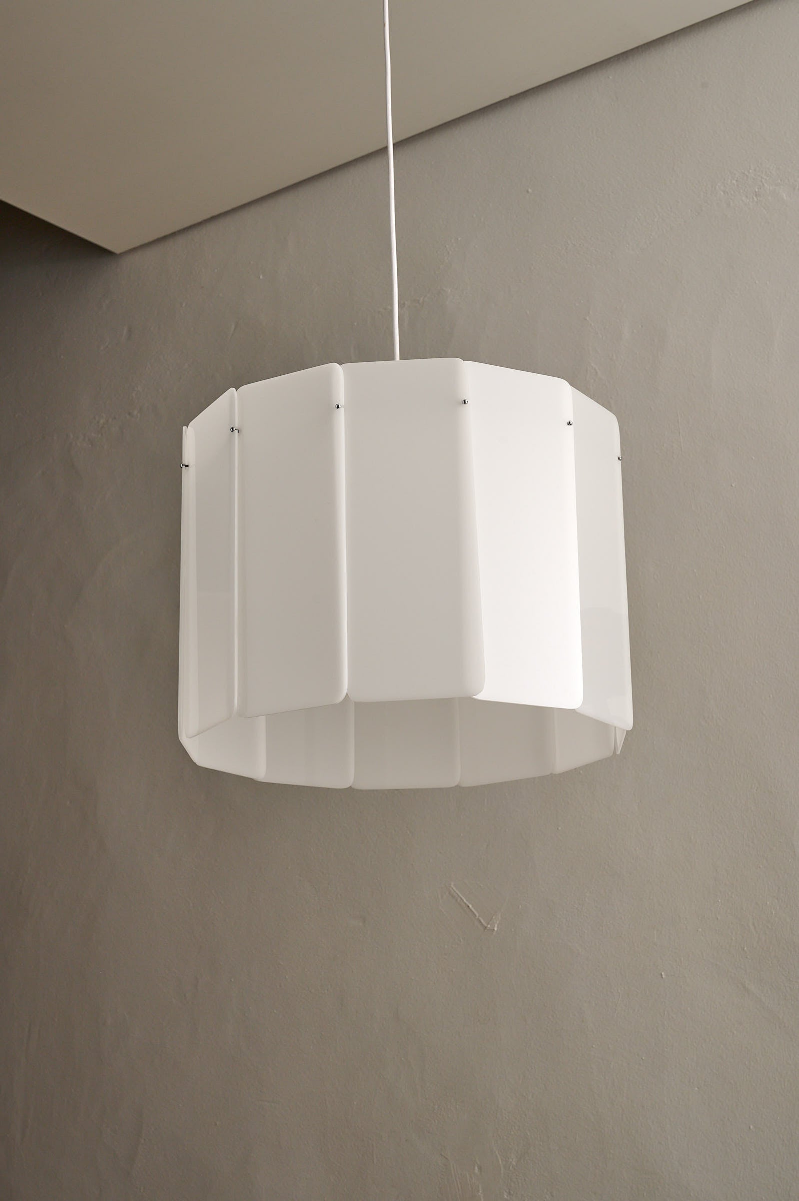 Acrylic Panel Drum Pendant, Germany, 1970s hanging lamp with white acrylic panels and metal frame.