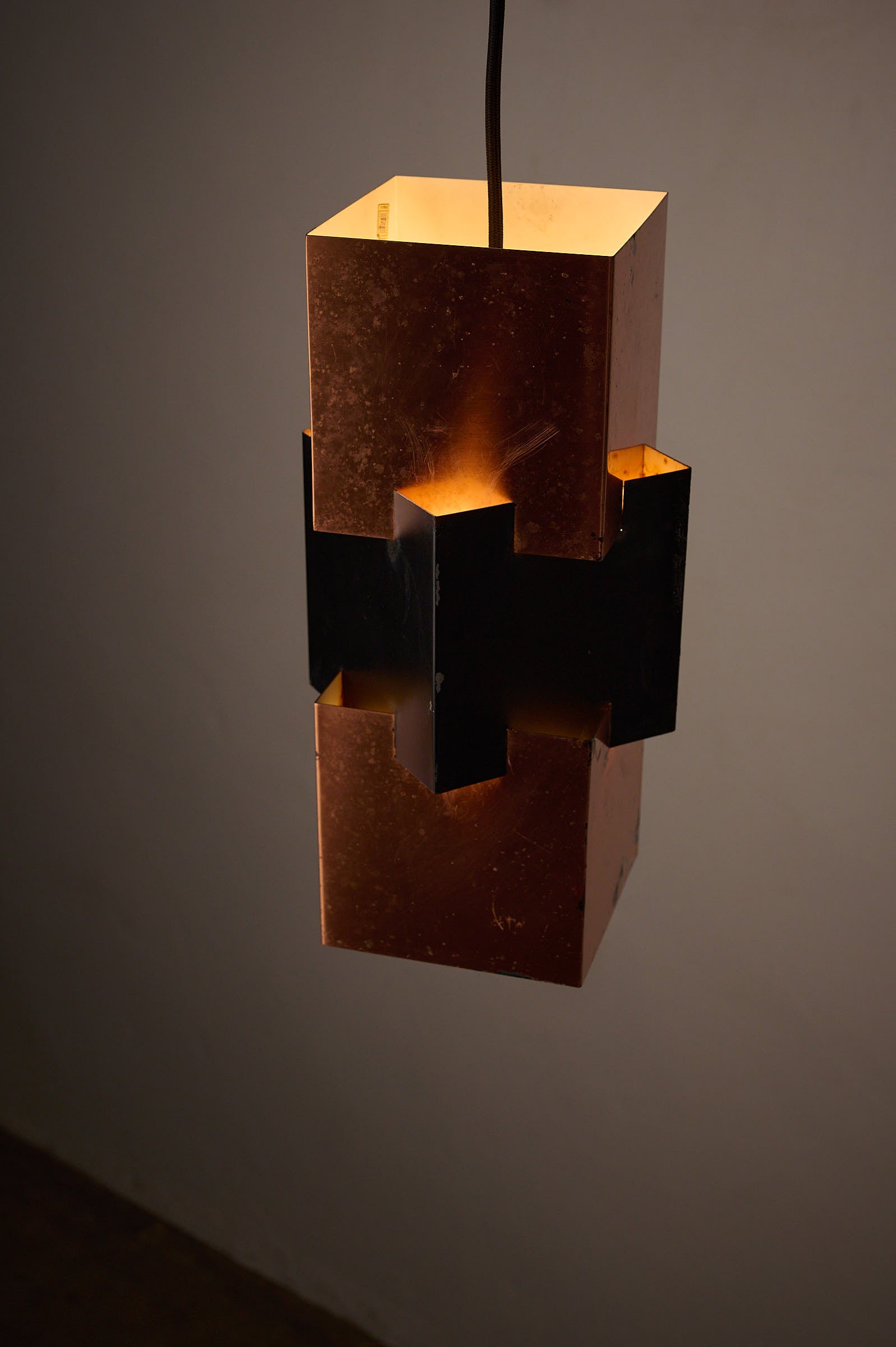 Patinated Jo Hammerborg for Fog & Mørup Kubus Pendant, Denmark, 1960s hanging lamp with copper and black metal design.
