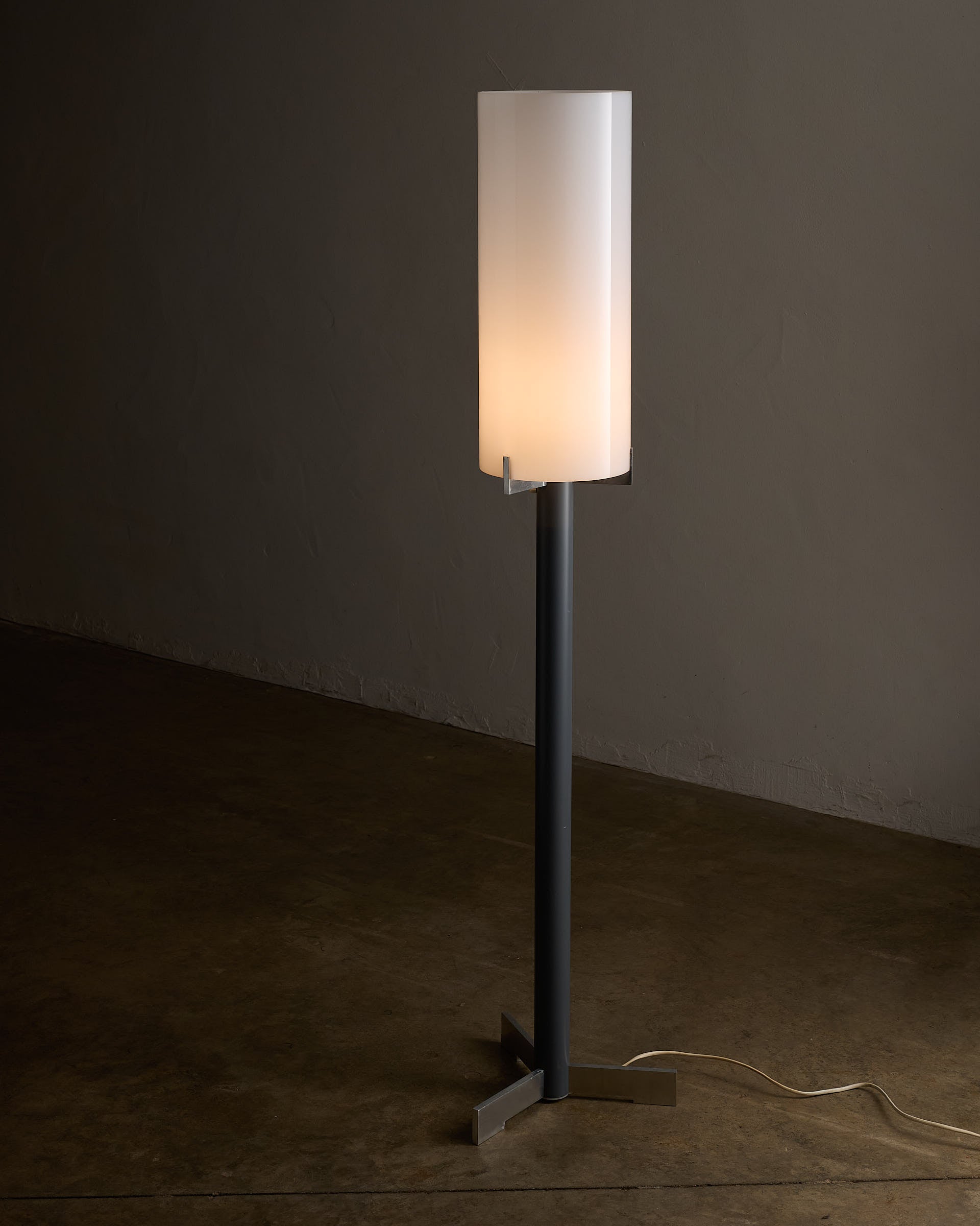 Industrial Minimalist Floor Lamp with Cylindrical Diffuser, Europe, 1970s on a dark background.