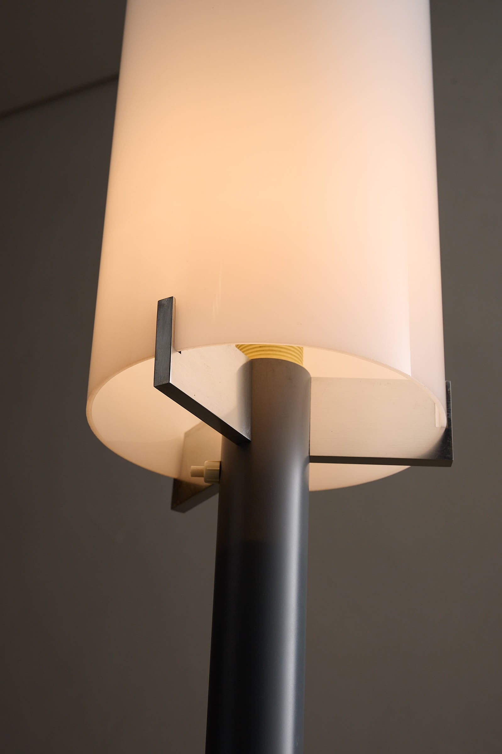 Industrial Minimalist Floor Lamp with Cylindrical Diffuser, Europe, 1970s close-up of white shade and brushed steel bracket.