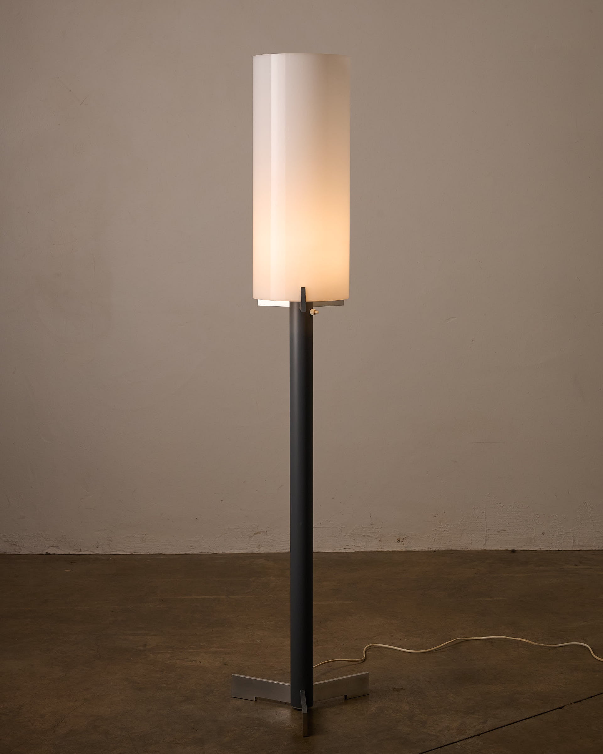 Industrial Minimalist Floor Lamp with Cylindrical Diffuser, Europe, 1970s in a modern setting.