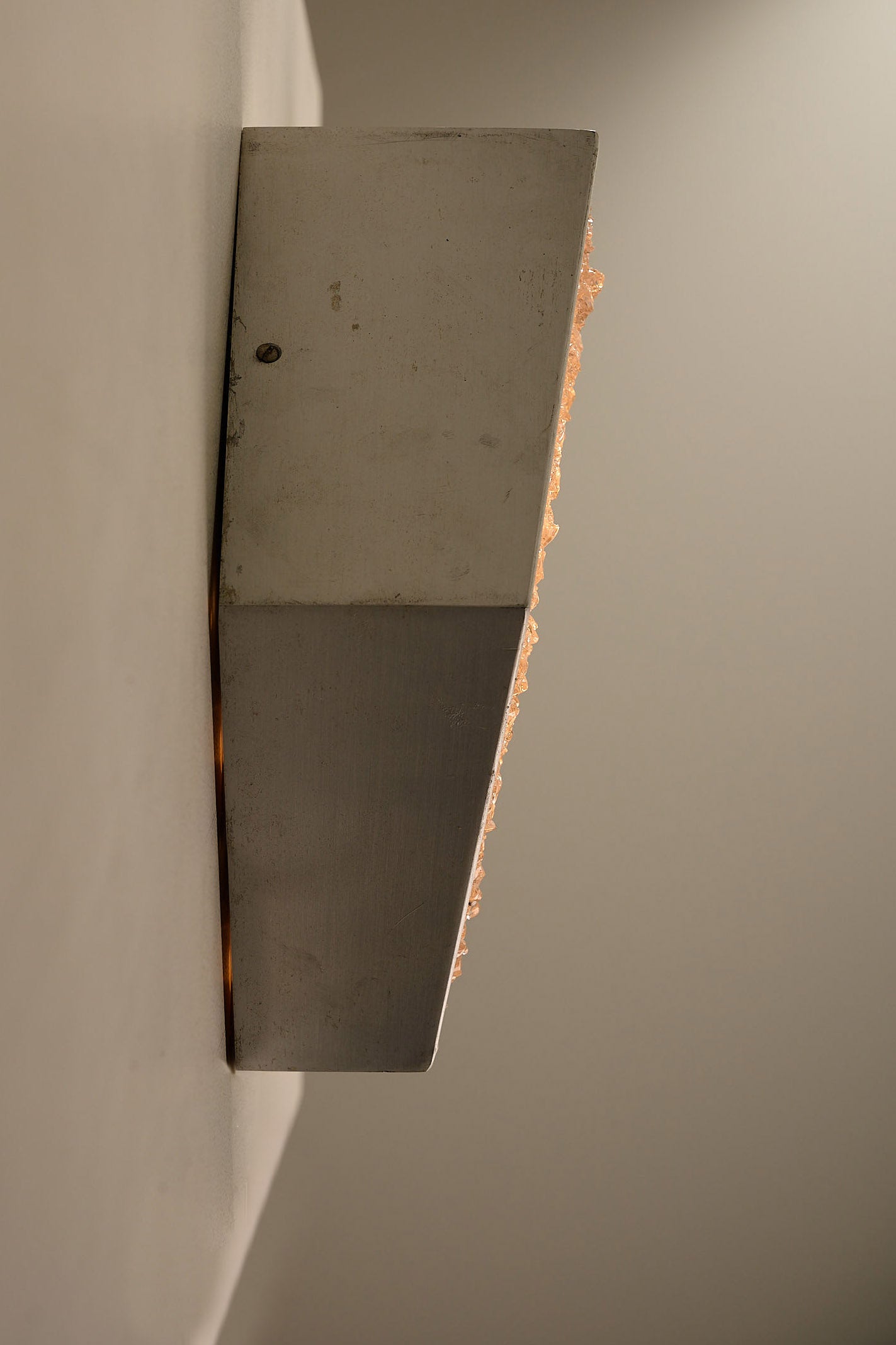 Diamond Wall Lights in Structured Glass and Aluminium, Germany, 1970s mounted on the wall, showcasing a sharp diamond profile.