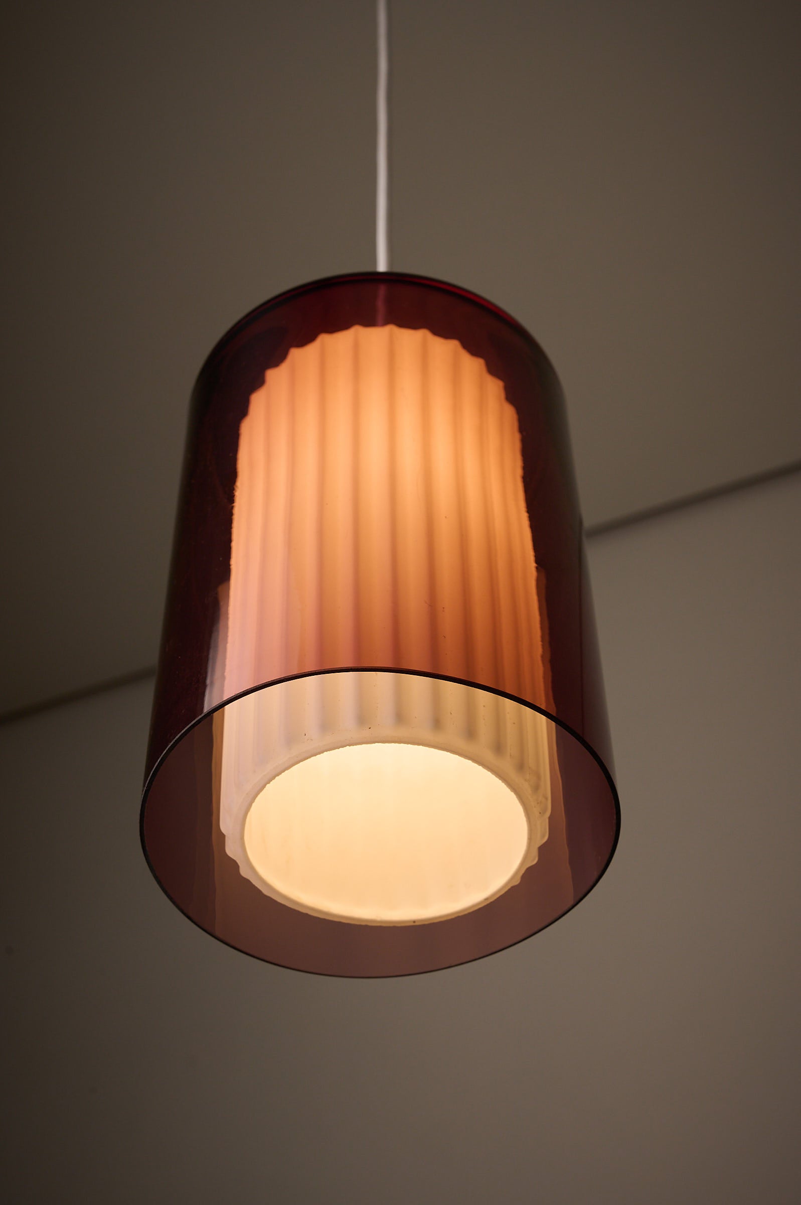 Double Glass Pendant in Lilac and Opaline, Europe, 1960s/1970s hanging lamp with dual-layer glass shade.