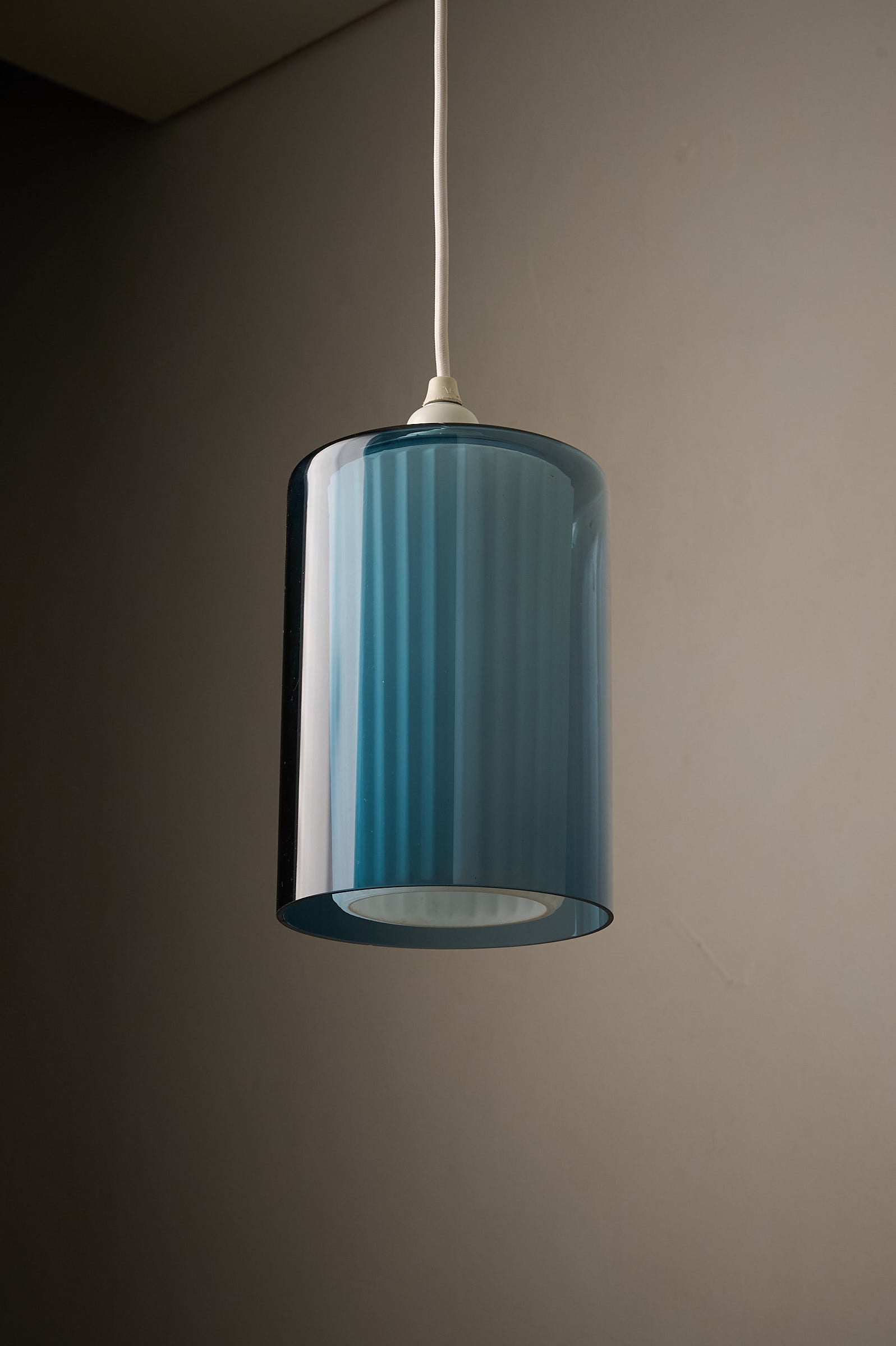 Double Glass Pendant in Blue and Opaline, Europe, 1960s/1970s, featuring a fluted opaline glass diffuser.