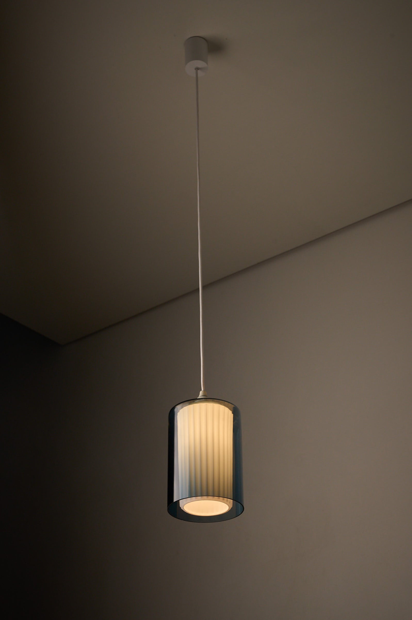 Double Glass Pendant in Blue and Opaline, Europe, 1960s/1970s hanging lamp with fluted opaline glass diffuser.