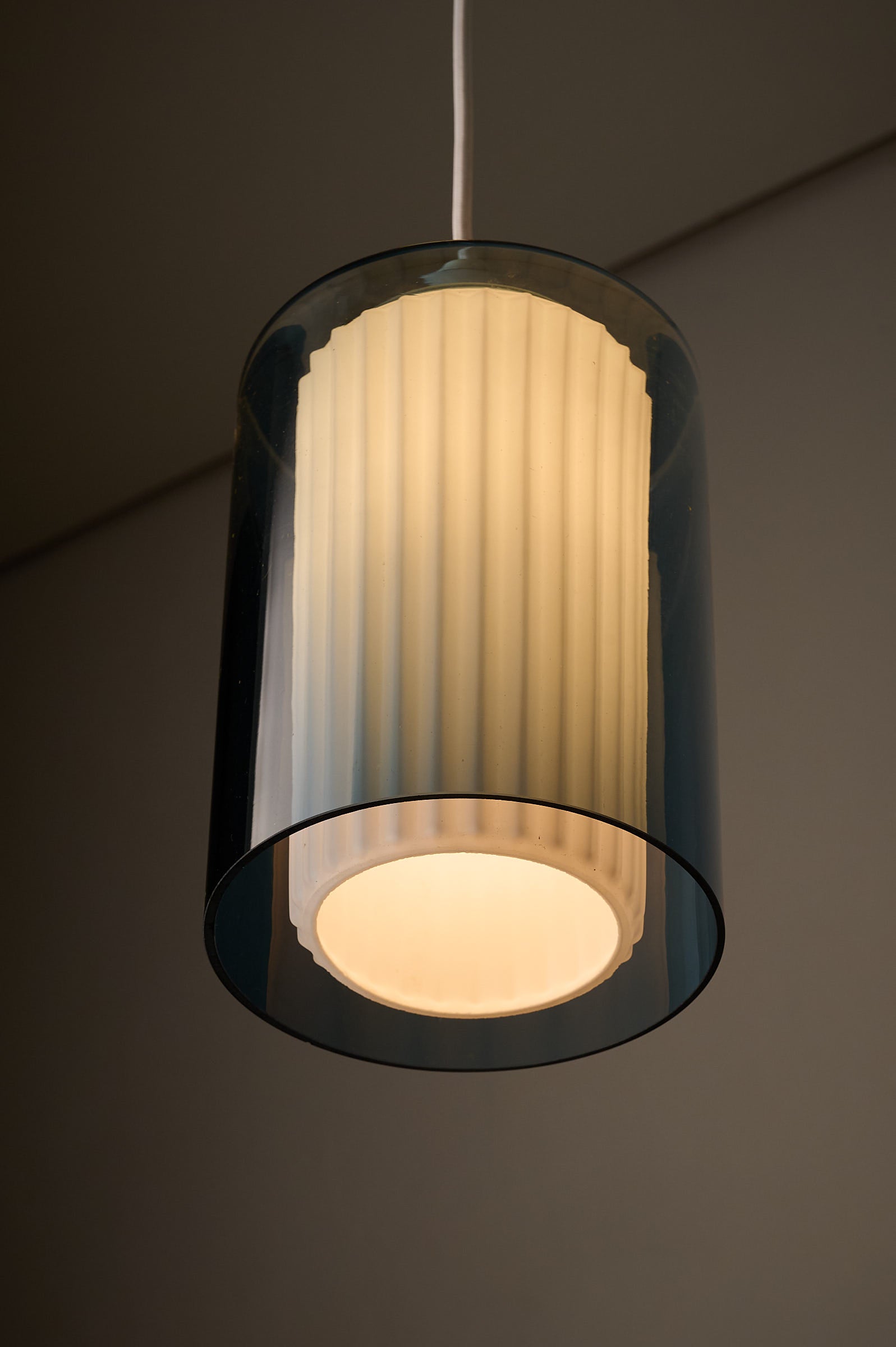 Double Glass Pendant in Blue and Opaline, Europe, 1960s/1970s hanging lamp with fluted inner diffuser.