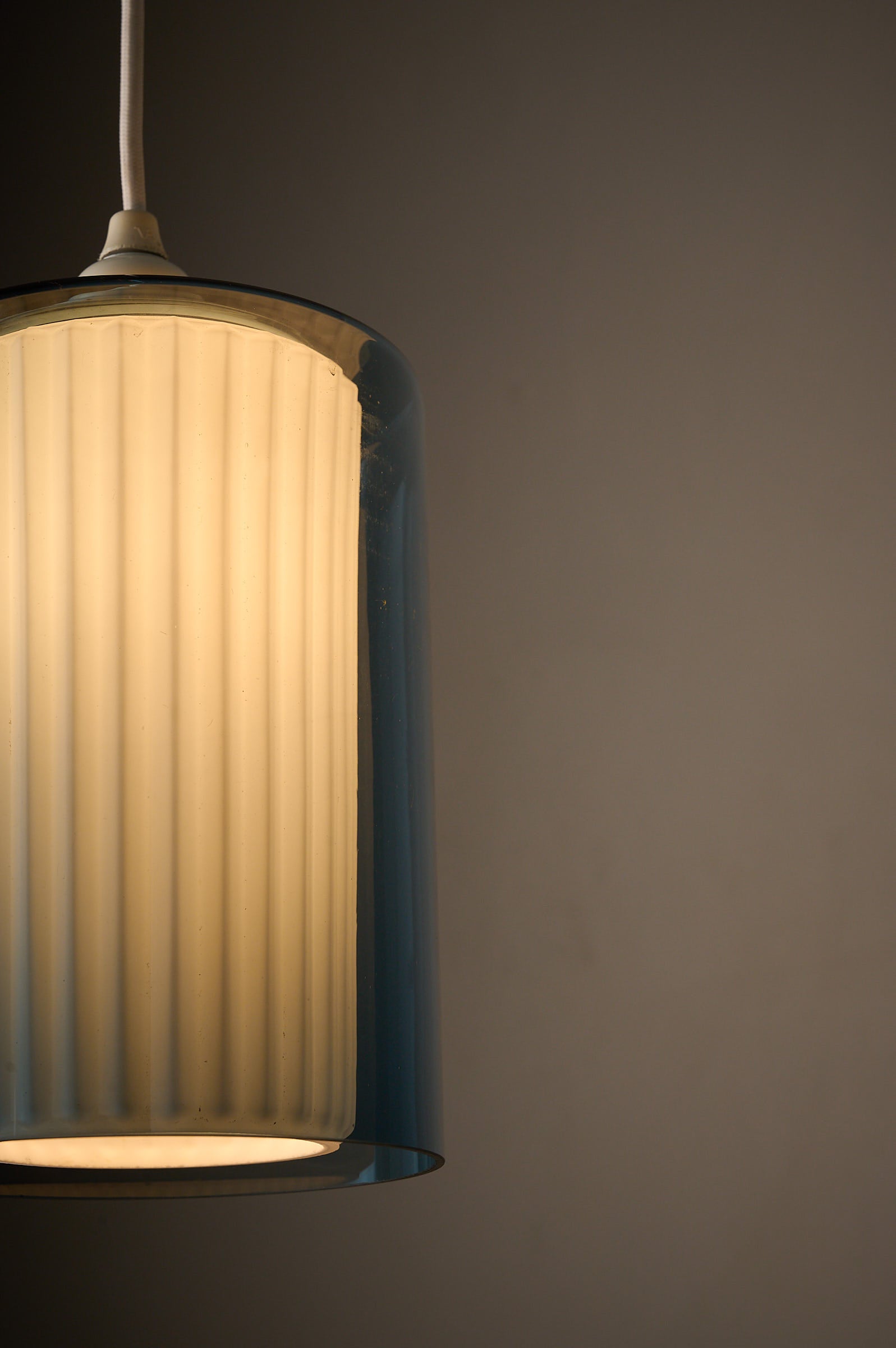Double Glass Pendant in Blue and Opaline, Europe, 1960s/1970s showcasing its dual-layer glass construction.