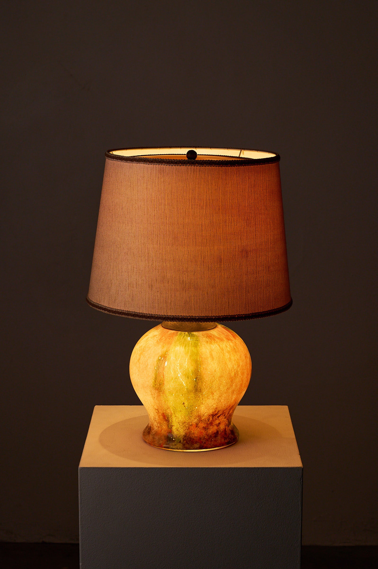 1970s Mid-Century Modern Multicolored Art Glass Table Lamp with brown shade and marbled glass base.