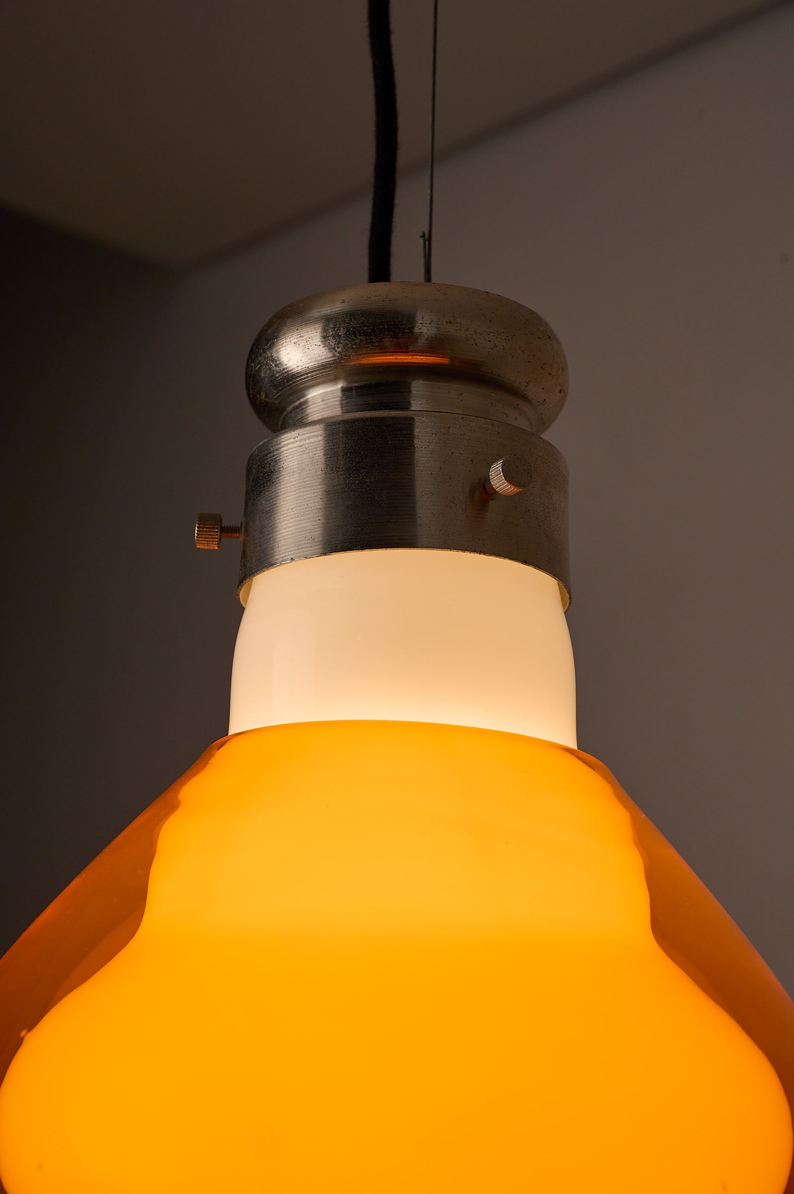 Space Age Blown Glass Pendant Lamp by Vistosi, Italy, 1970s with orange glass shade and brushed aluminum collar.