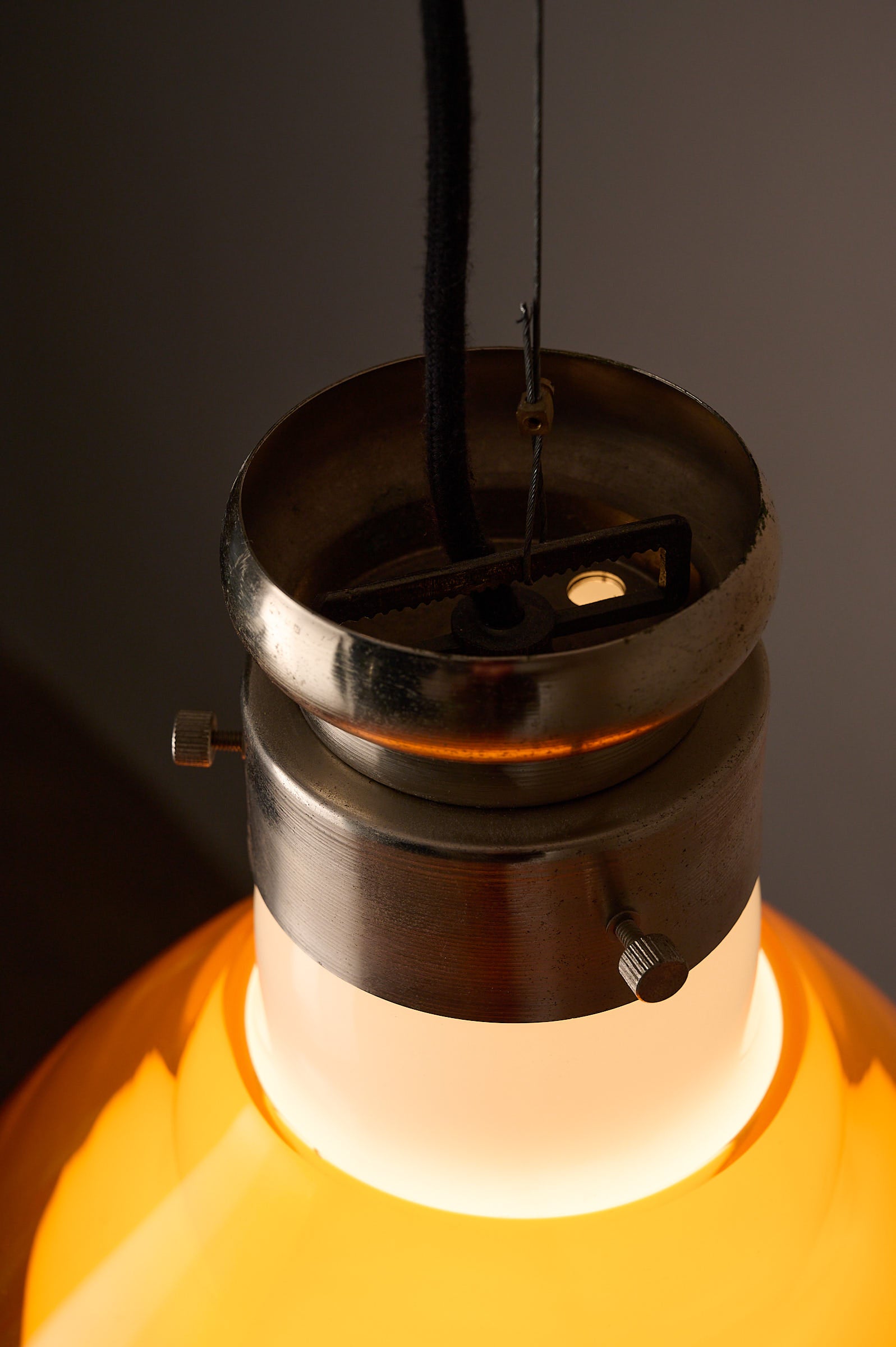Space Age Blown Glass Pendant Lamp by Vistosi, Italy, 1970s close-up of brushed aluminum collar and glass inner core.
